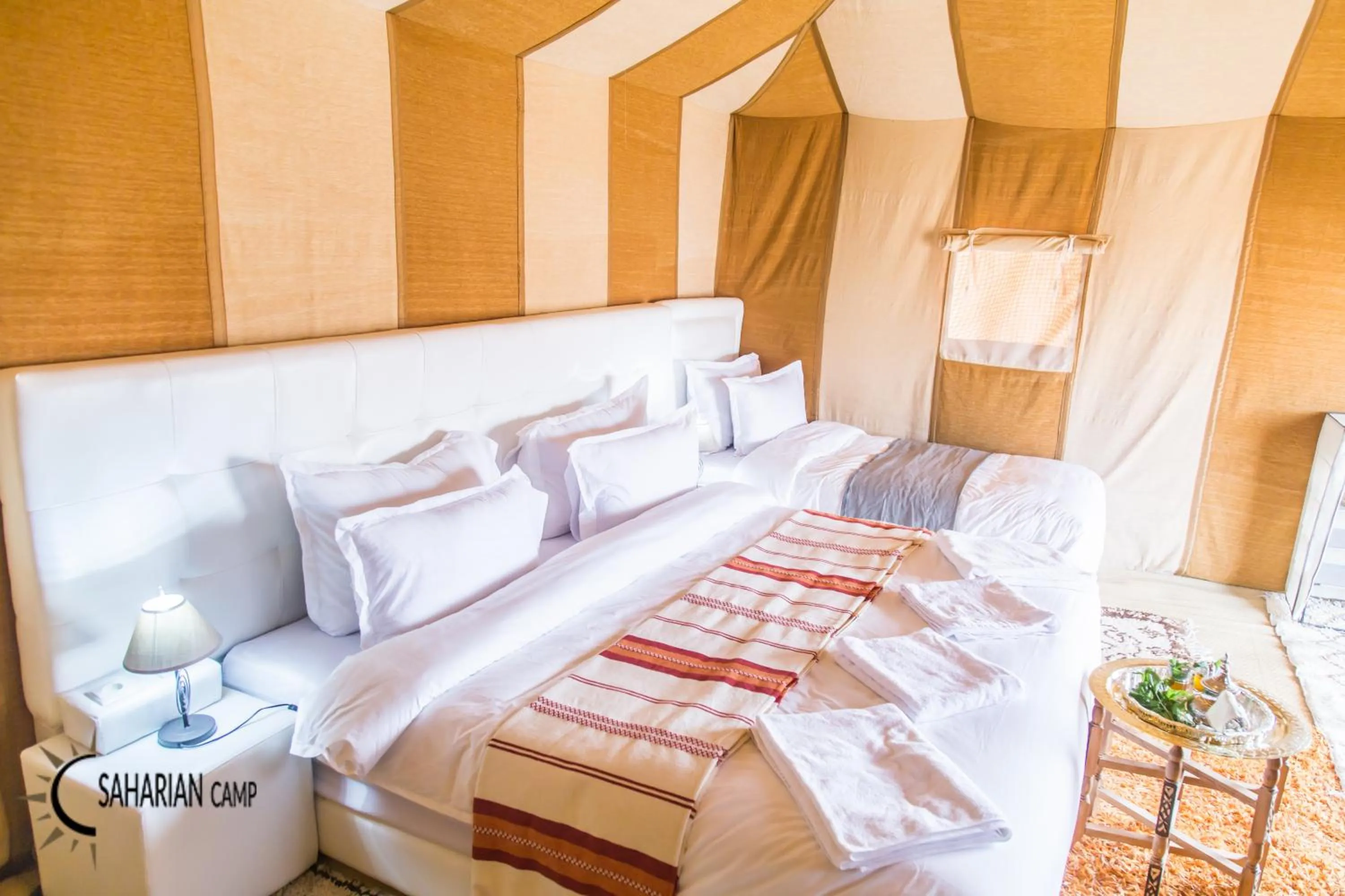 Photo of the whole room, Bed in Merzouga Luxury Camp