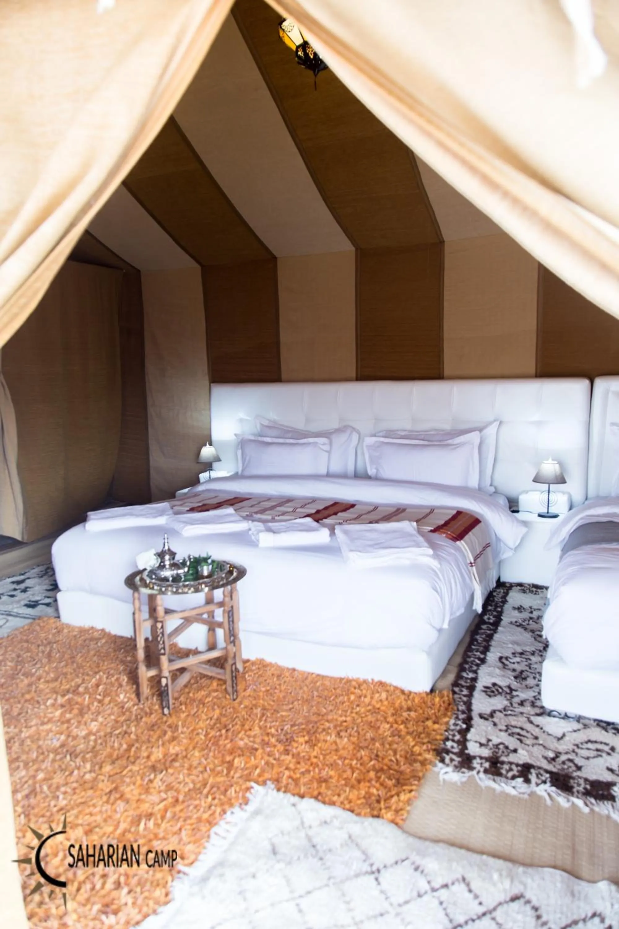 Bed in Merzouga Luxury Camp