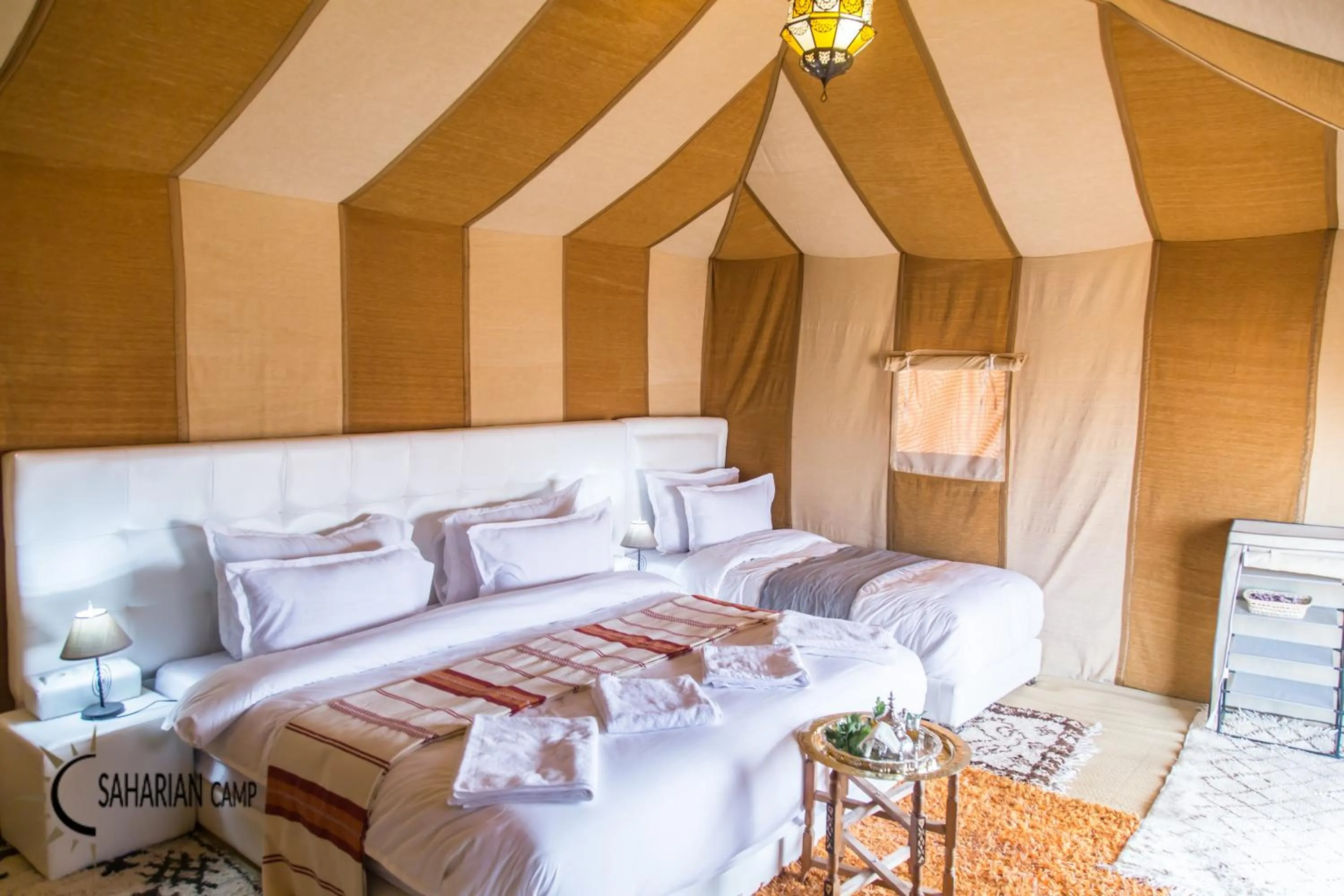 Photo of the whole room, Bed in Merzouga Luxury Camp