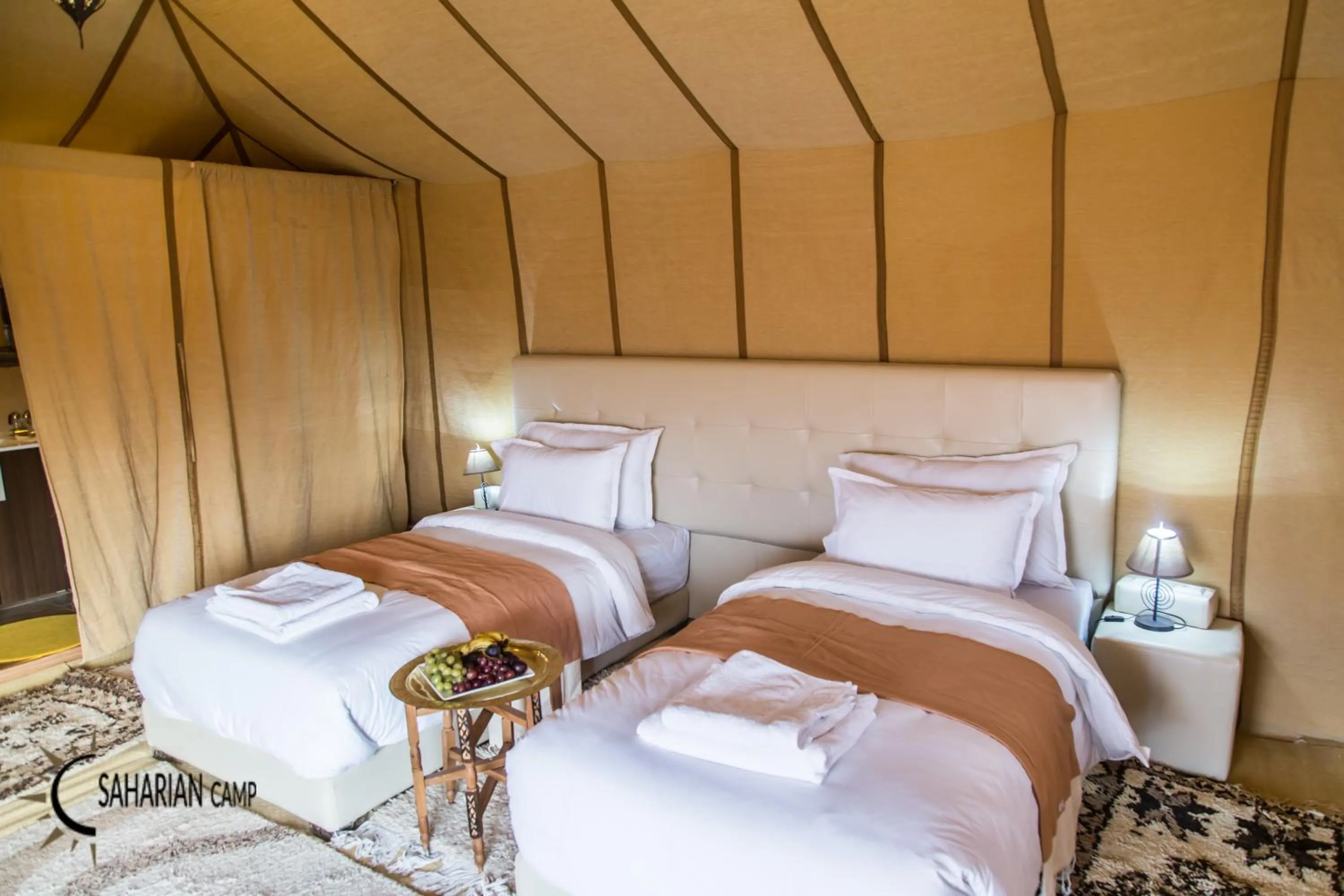 Bed in Merzouga Luxury Camp
