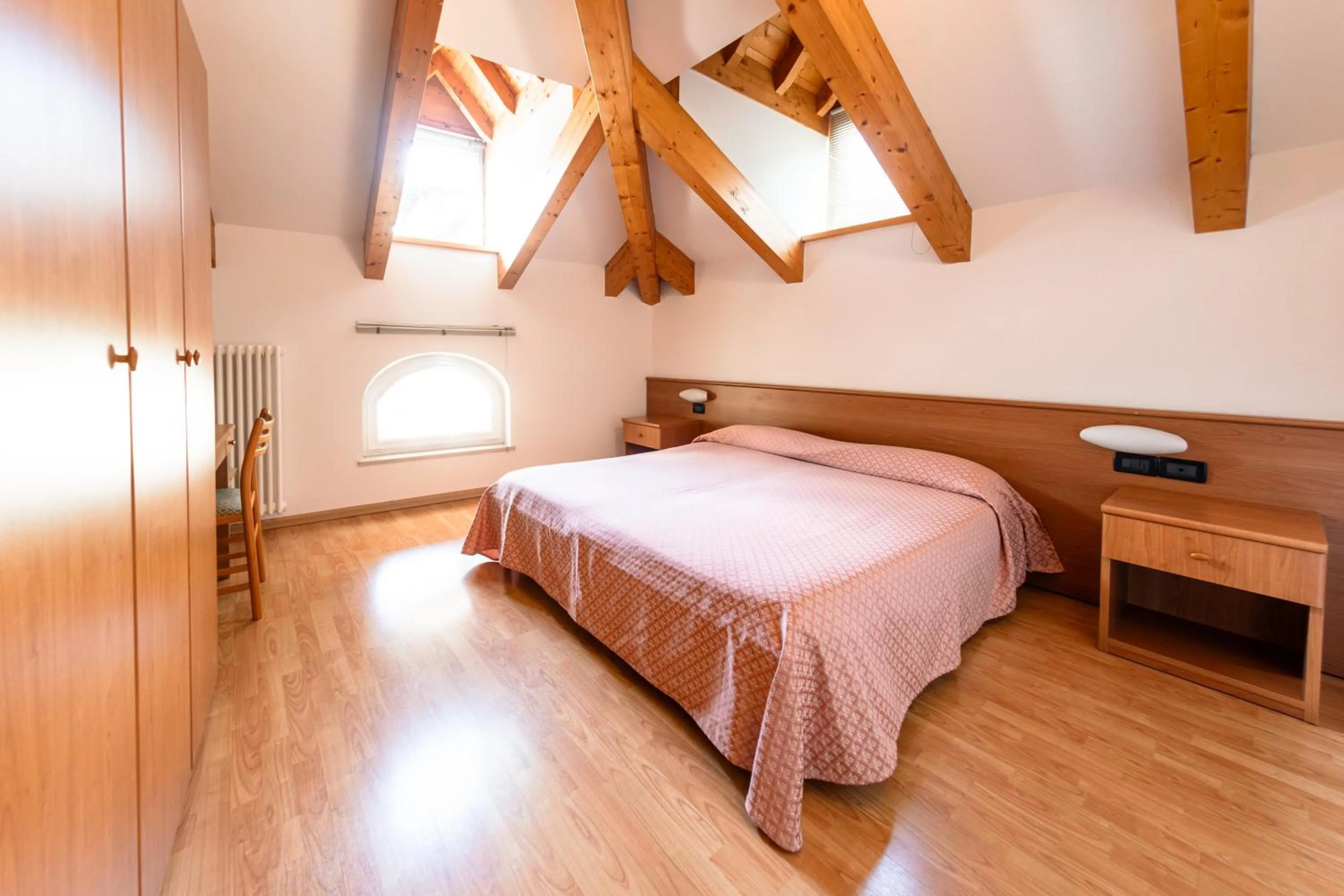 Bed in Hotel Vittoria