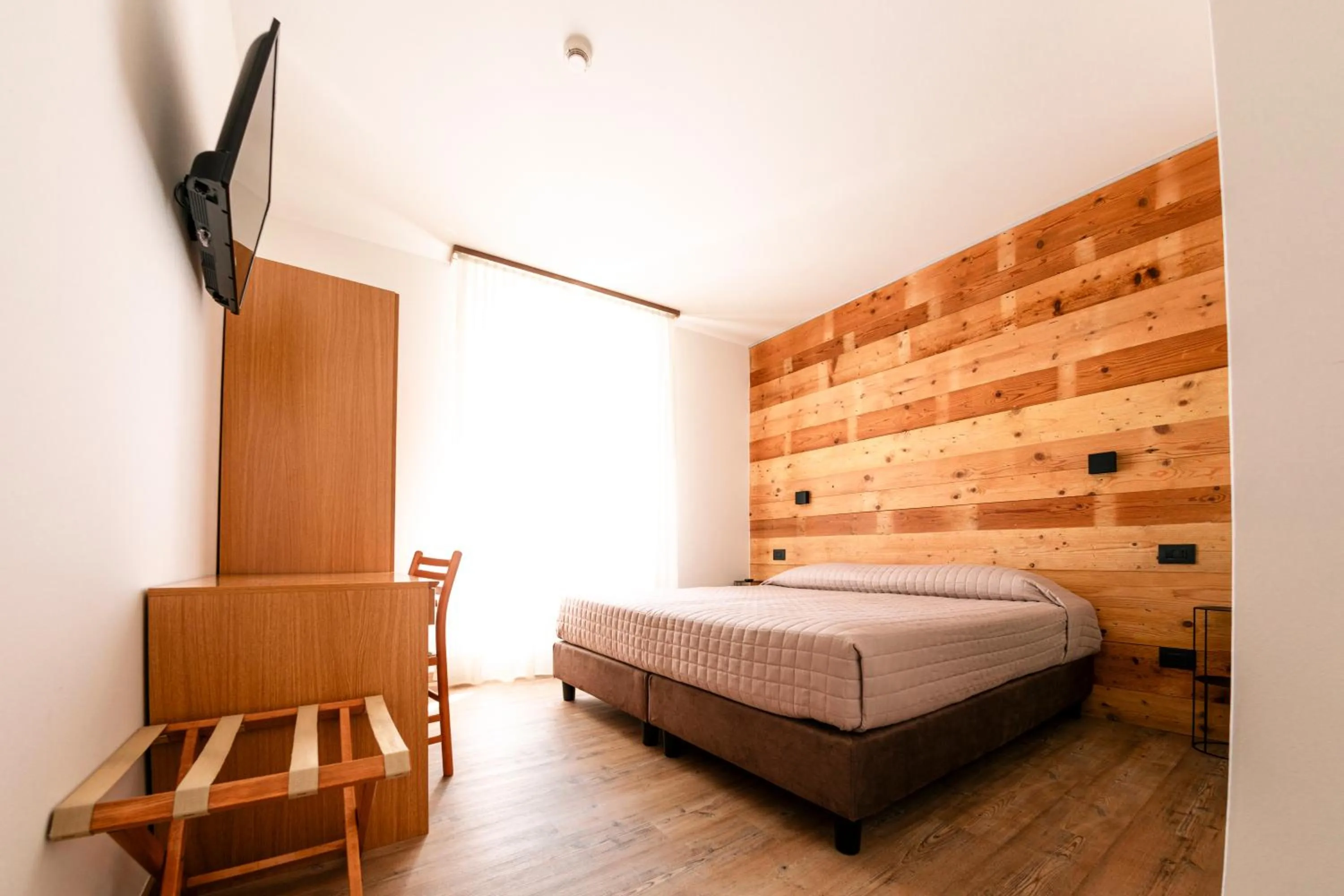 Bed in Hotel Vittoria