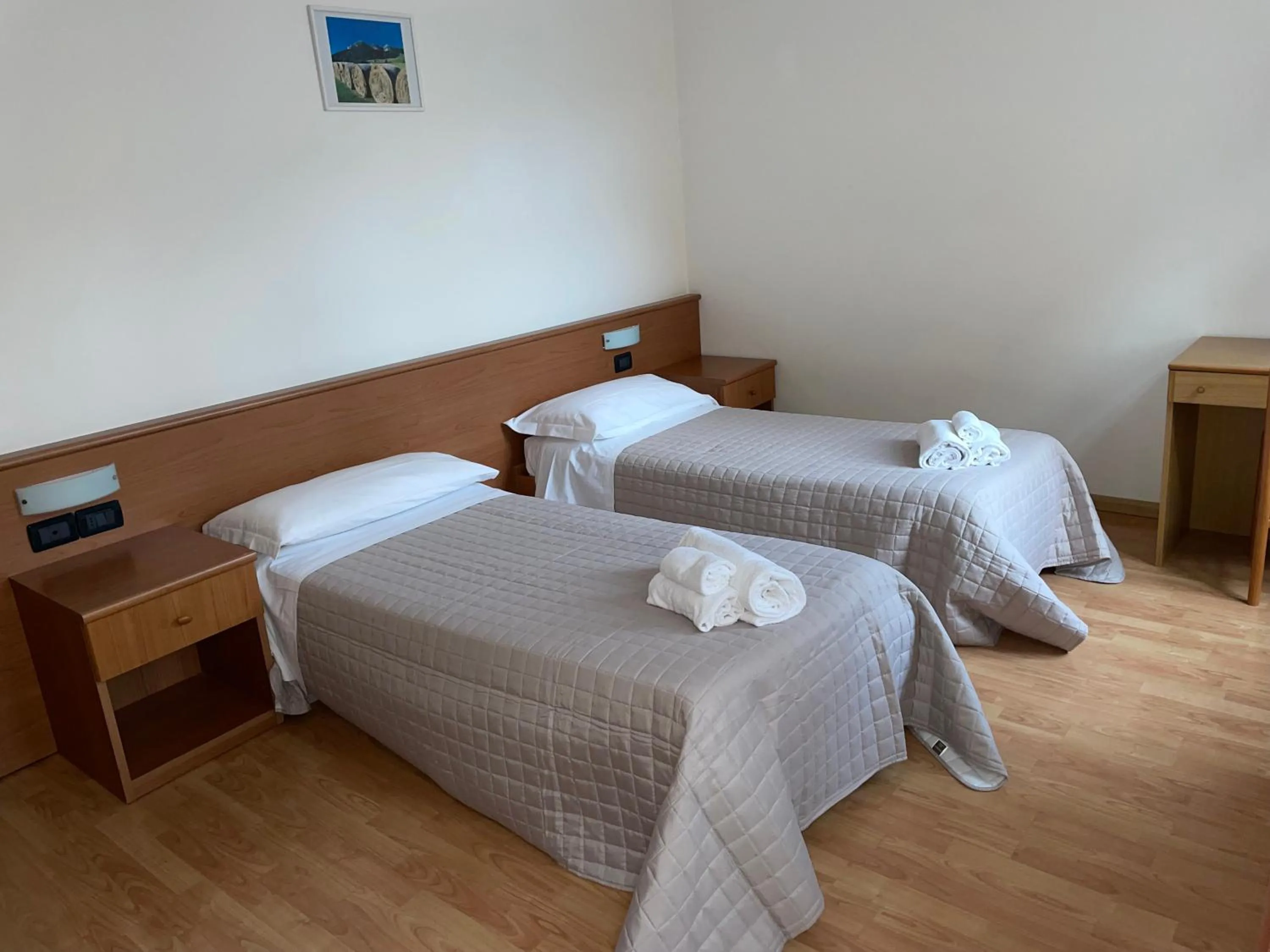 Bed in Hotel Vittoria