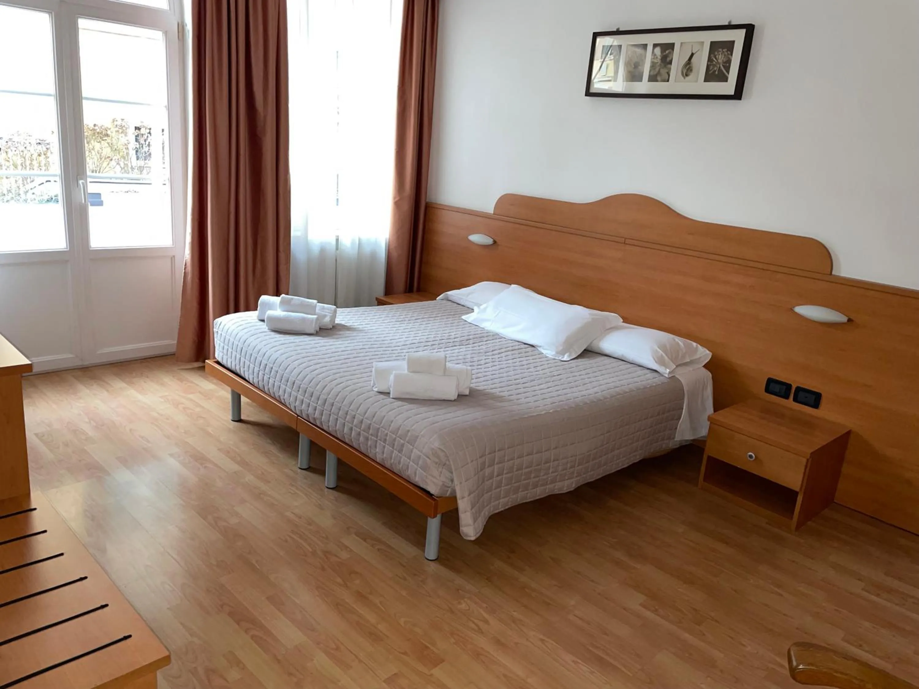 Bed in Hotel Vittoria