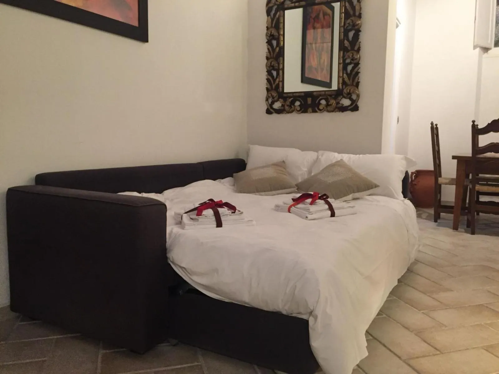 Living room, Bed in B&S Suite Colosseo