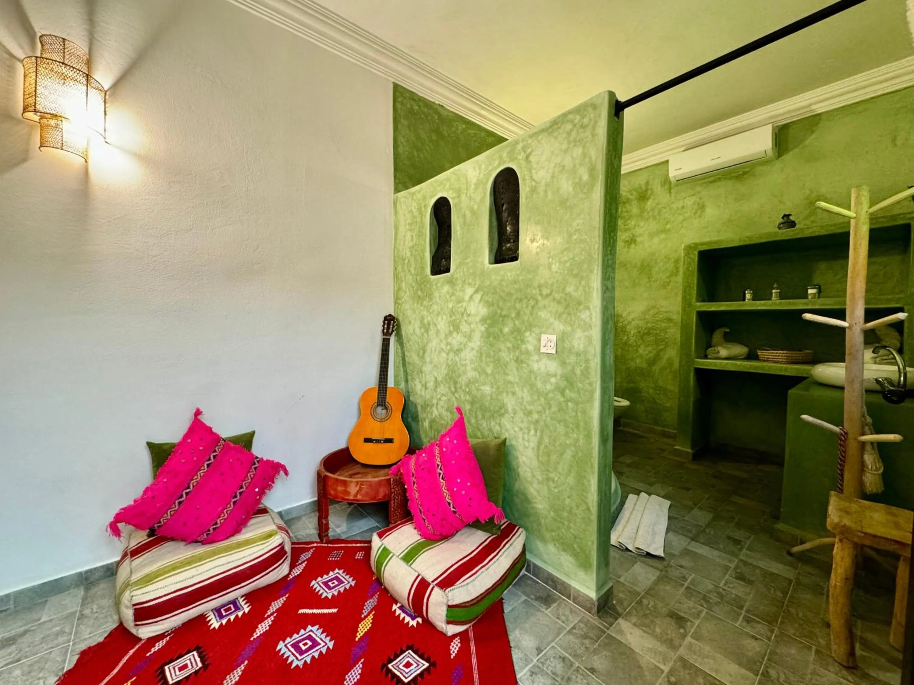 Communal lounge/ TV room in Riad Iklil