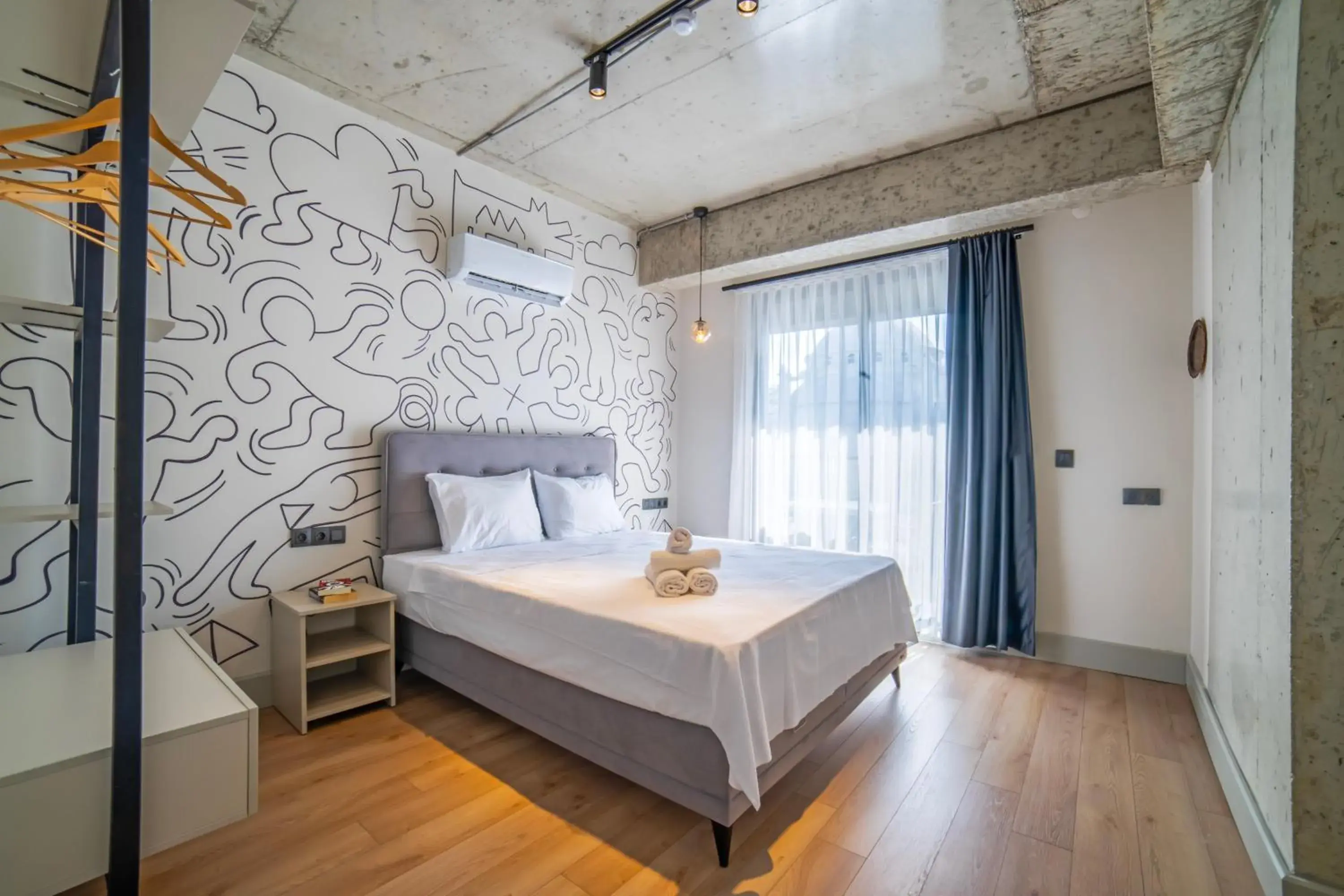 Bed in RudBlu Suites Bed in RudBlu Suites