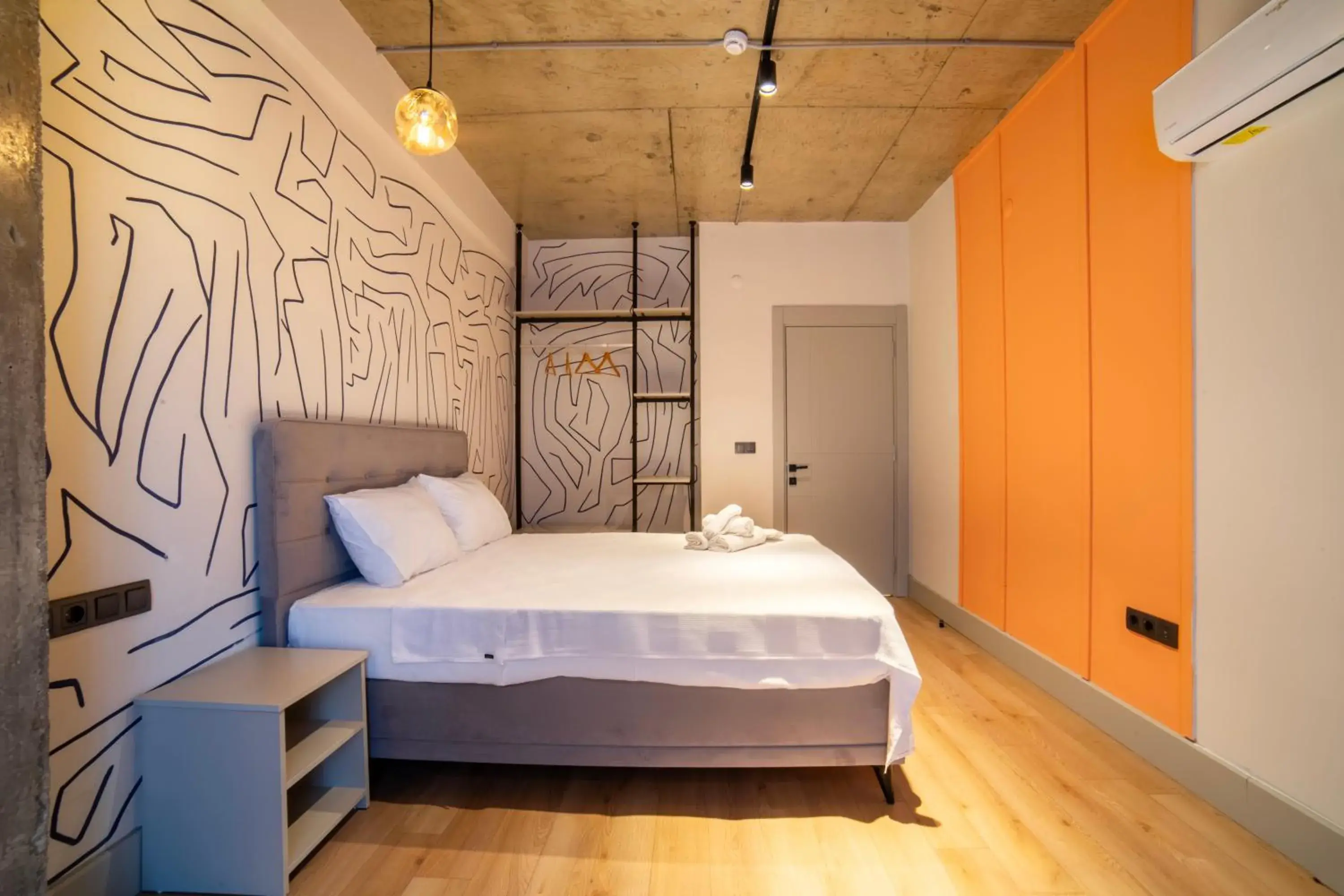 Bed in RudBlu Suites Bed in RudBlu Suites