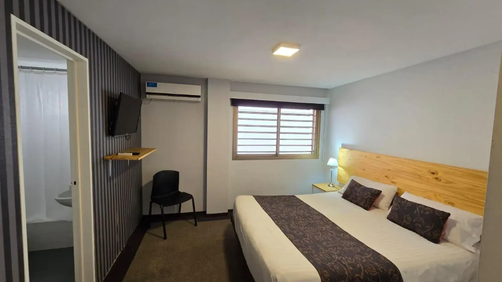 Bed in Santiago Hotel Bed in Santiago Hotel