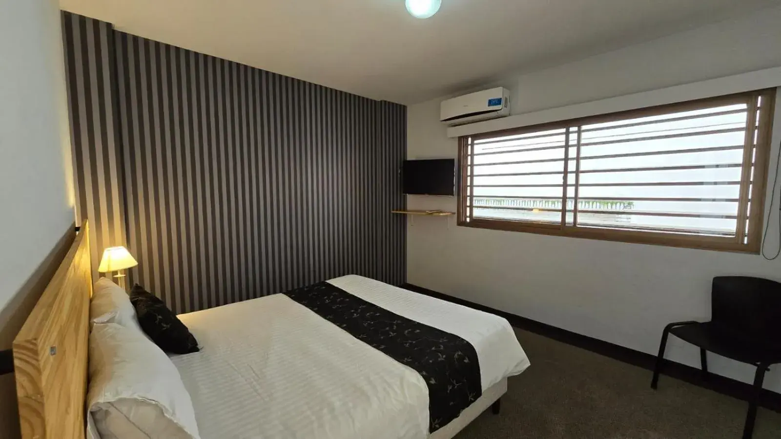 Bed in Santiago Hotel Bed in Santiago Hotel