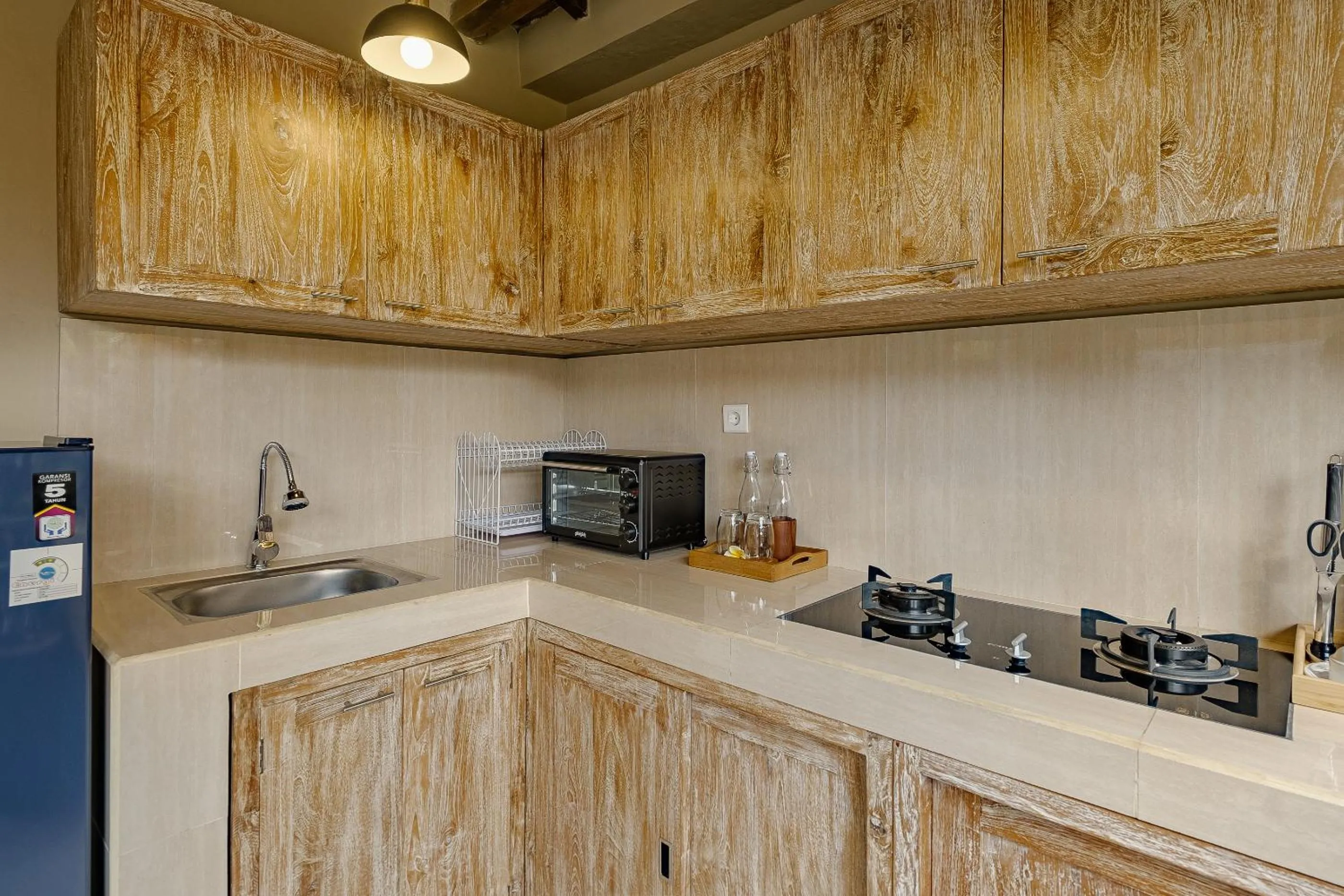 Kitchen or kitchenette in Astala Ubud Villa
