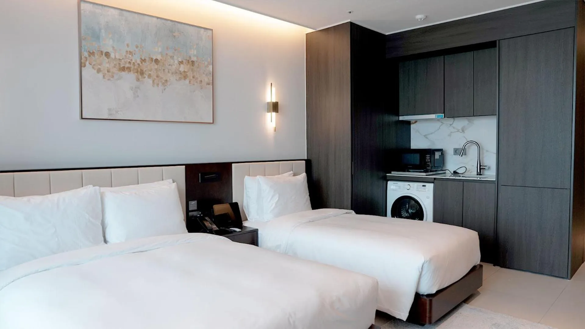 Bed in WAVEM HOTEL East