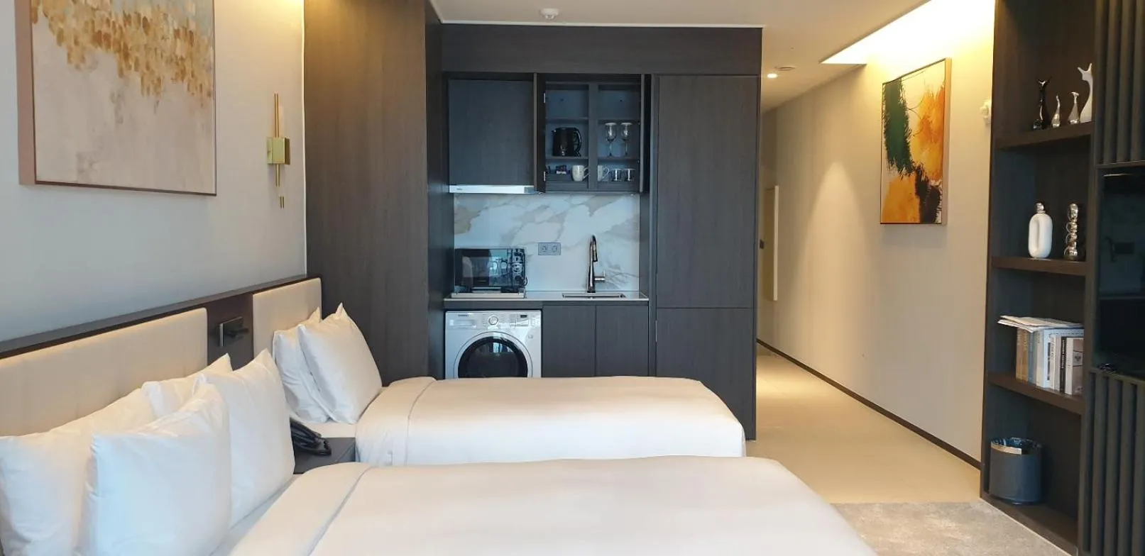 Bed in WAVEM HOTEL East