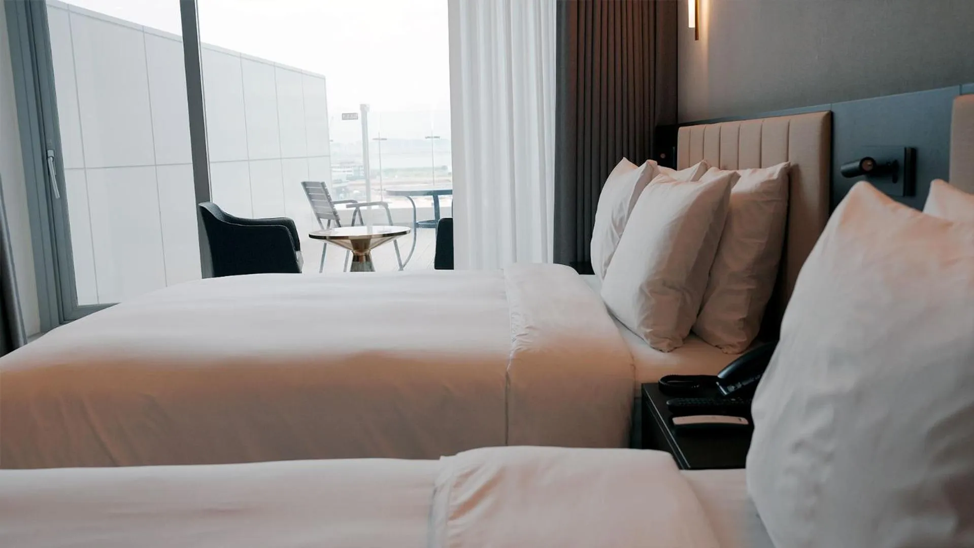 Bed in WAVEM HOTEL East