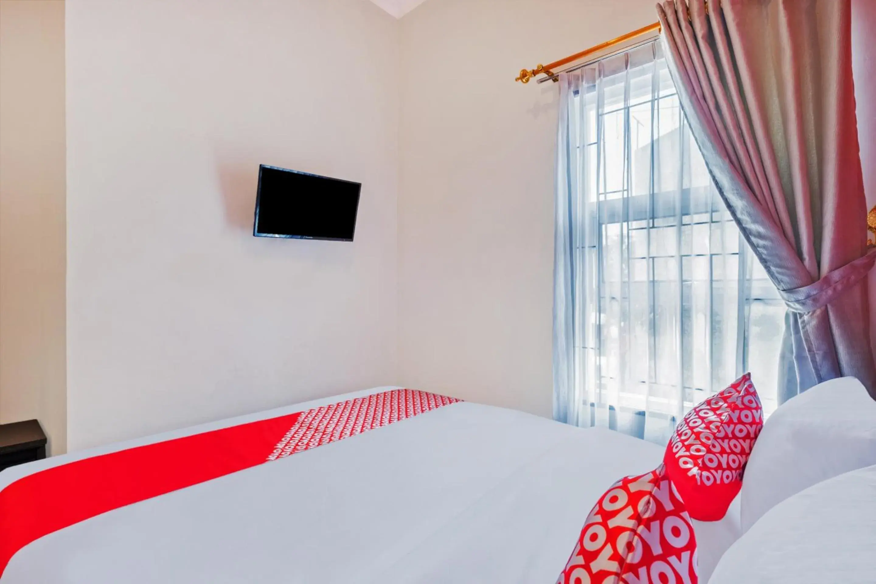 Bedroom in Hotel O Sudirman Guesthouse Syariah Bedroom in Hotel O Sudirman Guesthouse Syariah