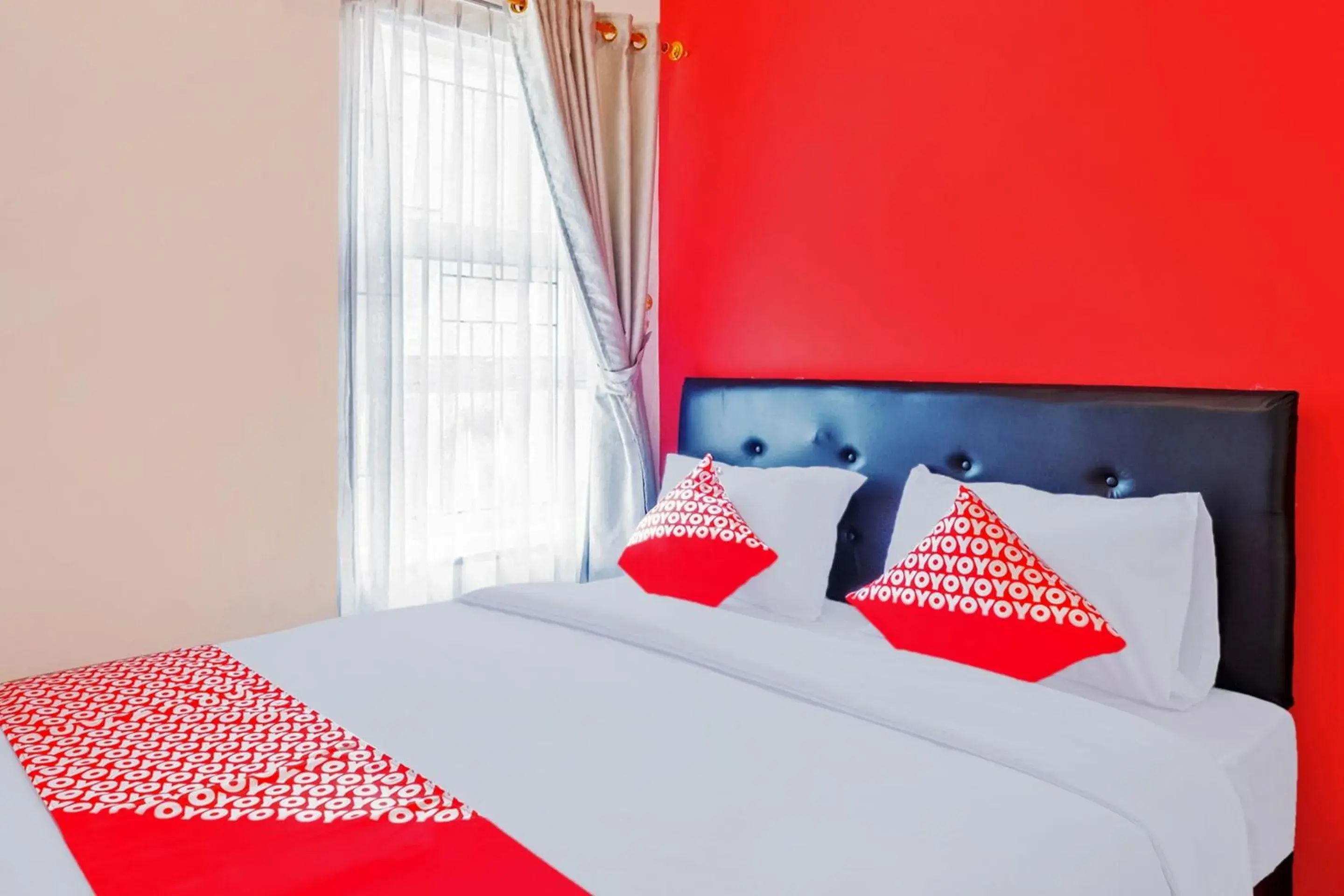 Bedroom in Hotel O Sudirman Guesthouse Syariah Bedroom in Hotel O Sudirman Guesthouse Syariah