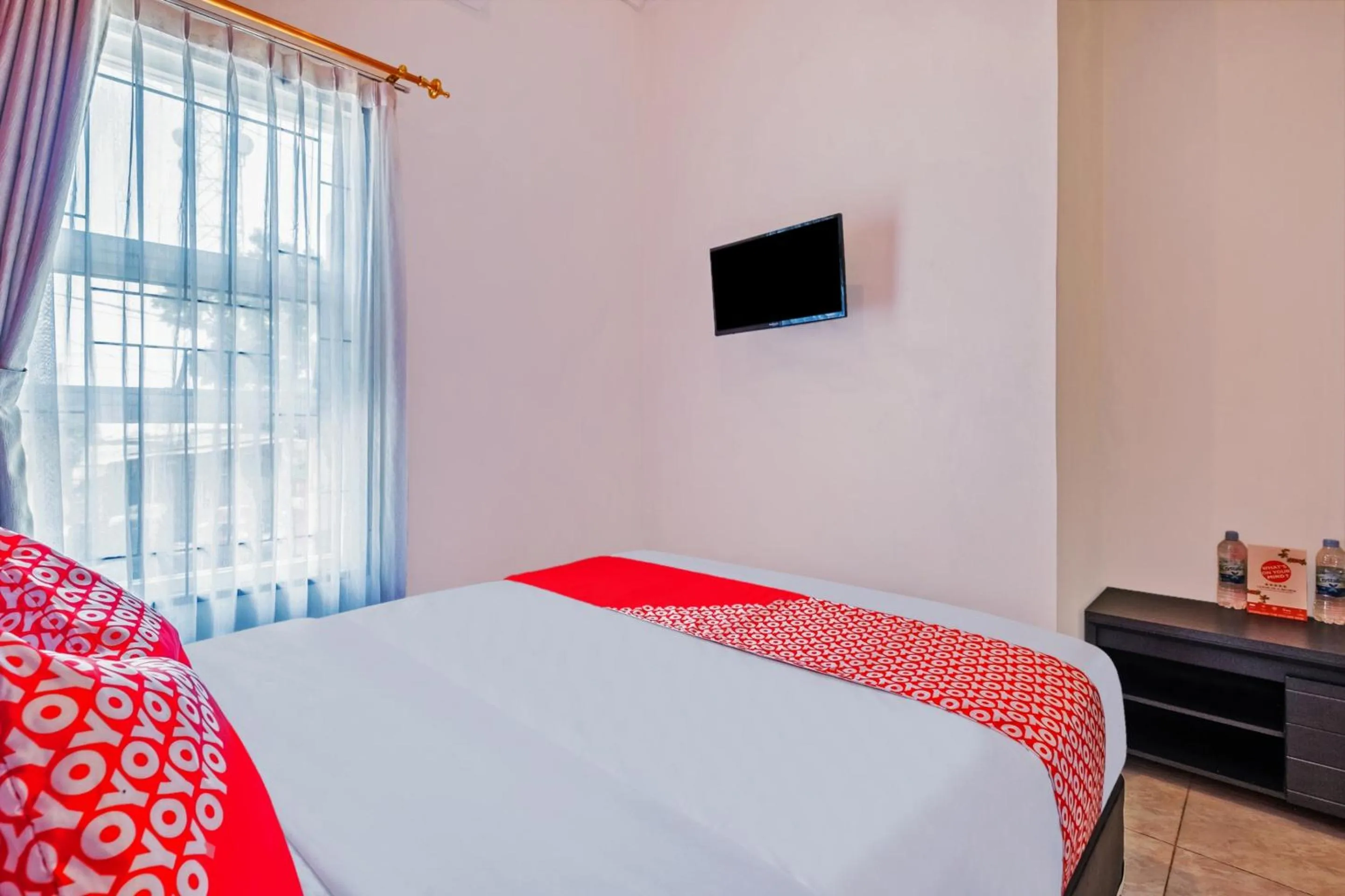 Photo of the whole room in Hotel O Sudirman Guesthouse Syariah