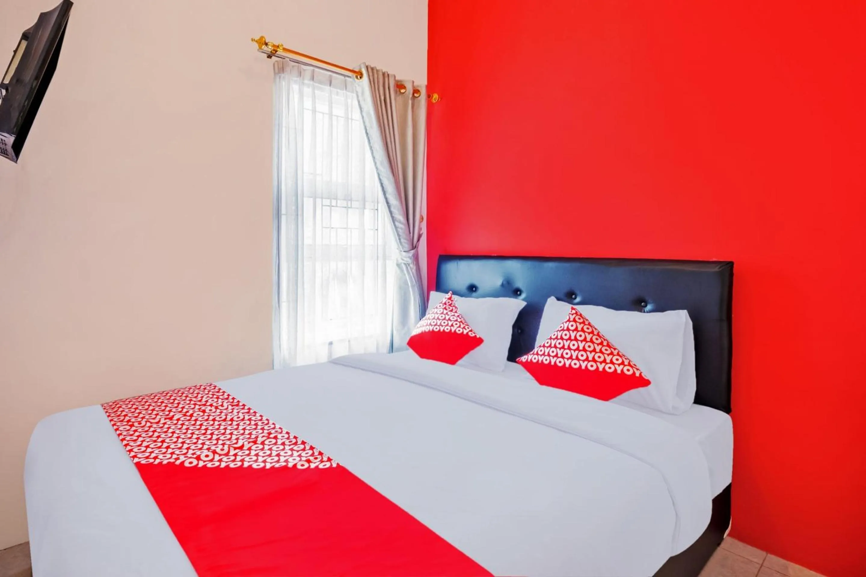 Bedroom in Hotel O Sudirman Guesthouse Syariah