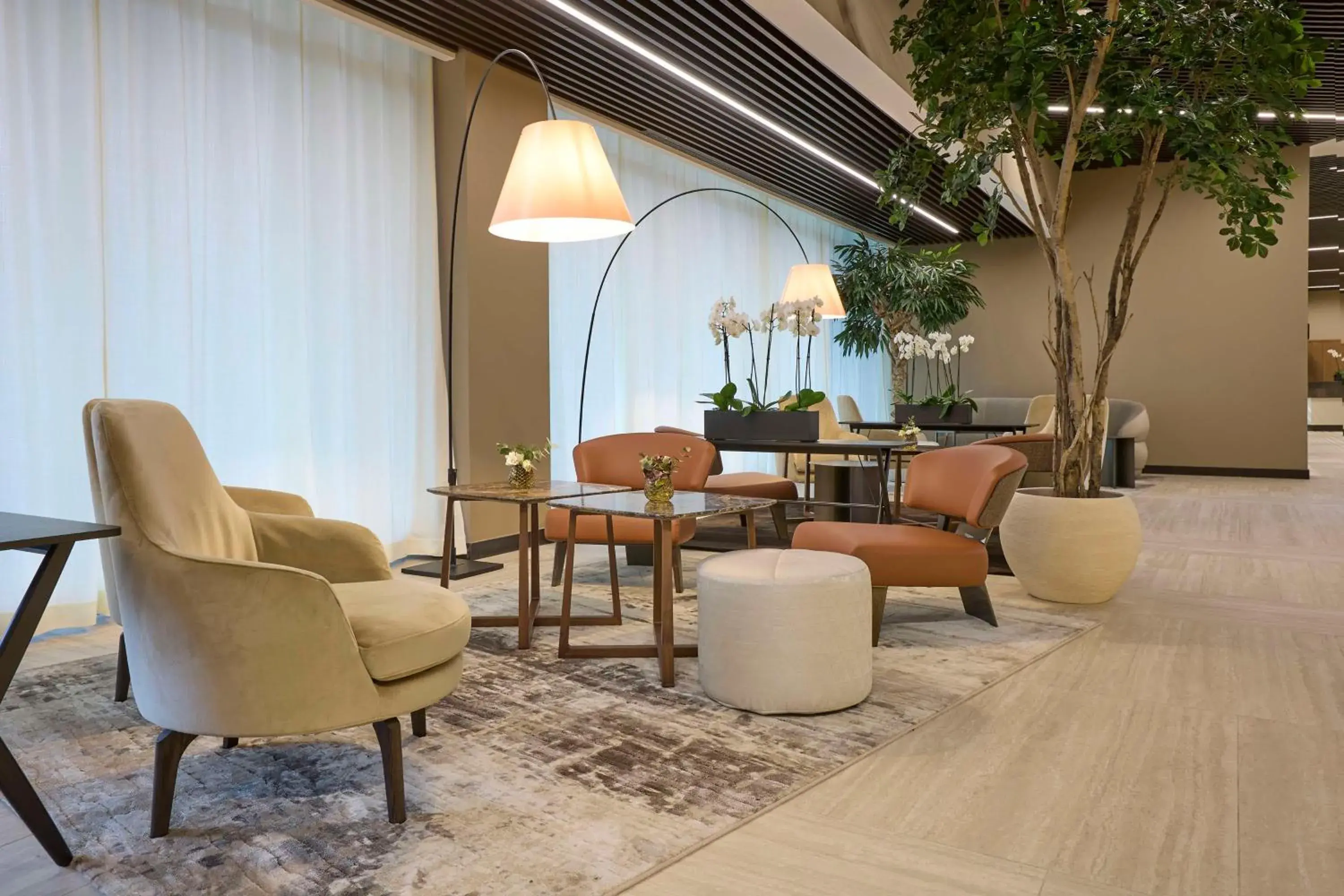 Lobby or reception in Radisson Blu Hotel, Bergamo ChorusLife Lobby or reception in Radisson Blu Hotel, Bergamo ChorusLife