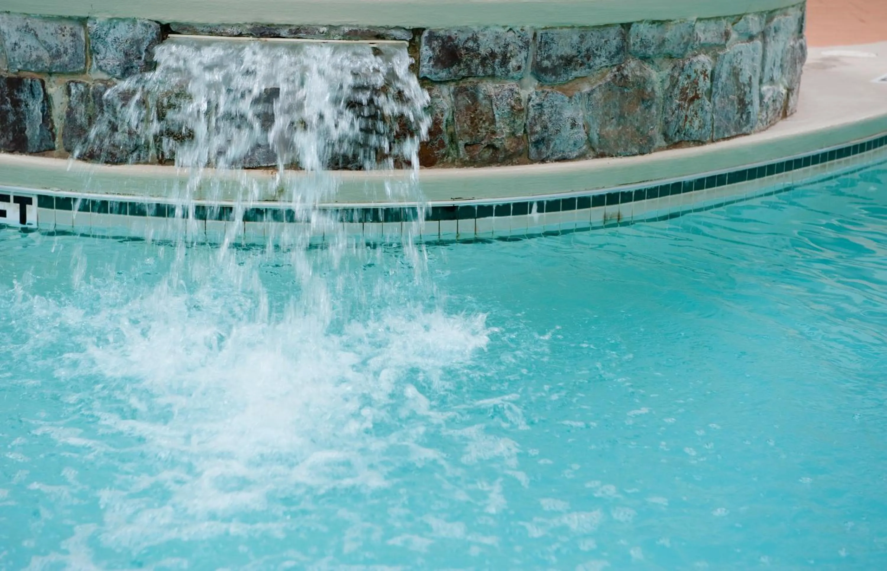 Swimming pool in Ramada by Wyndham State College Hotel & Conference Center