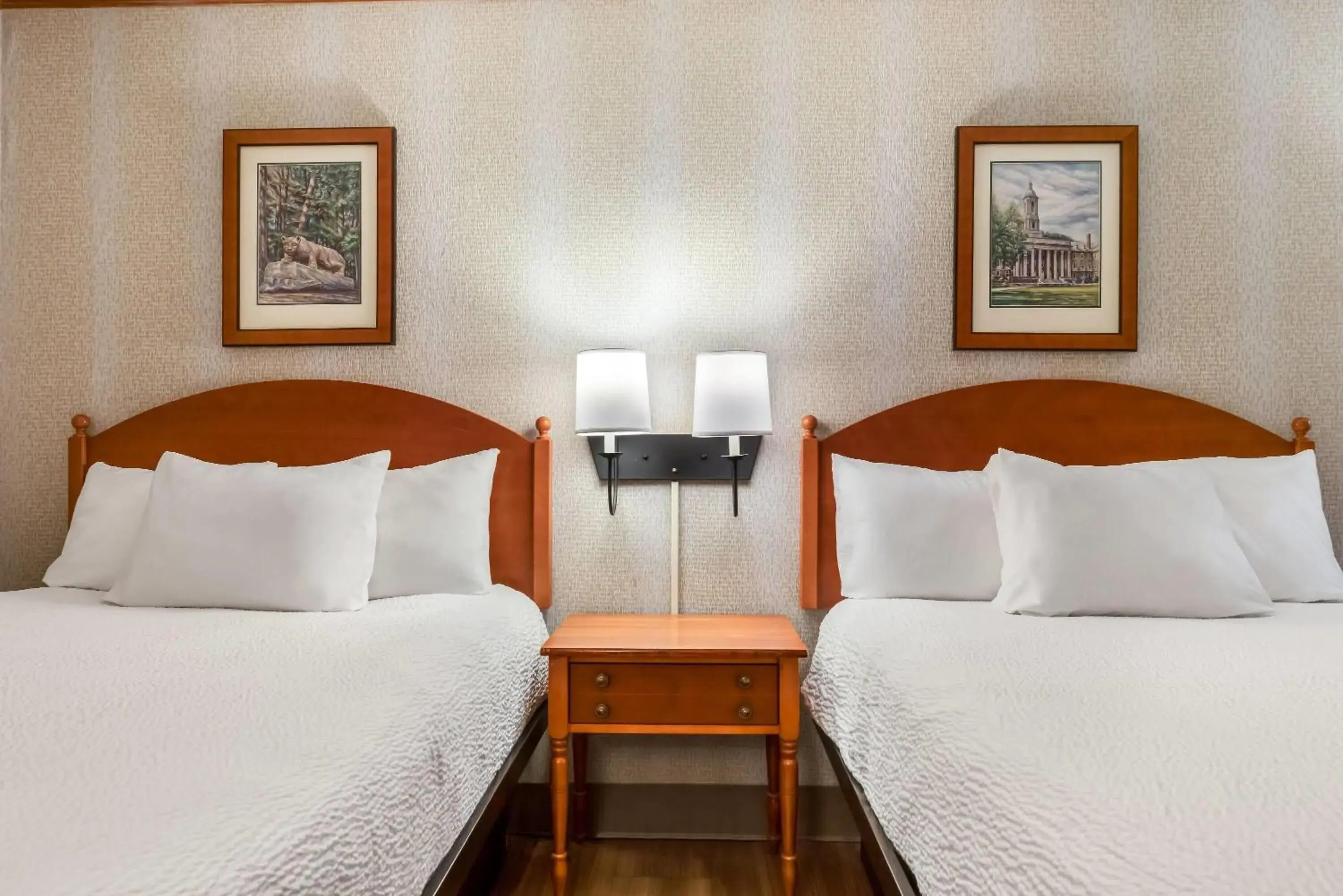 Bed in Ramada by Wyndham State College Hotel & Conference Center Bed in Ramada by Wyndham State College Hotel & Conference Center