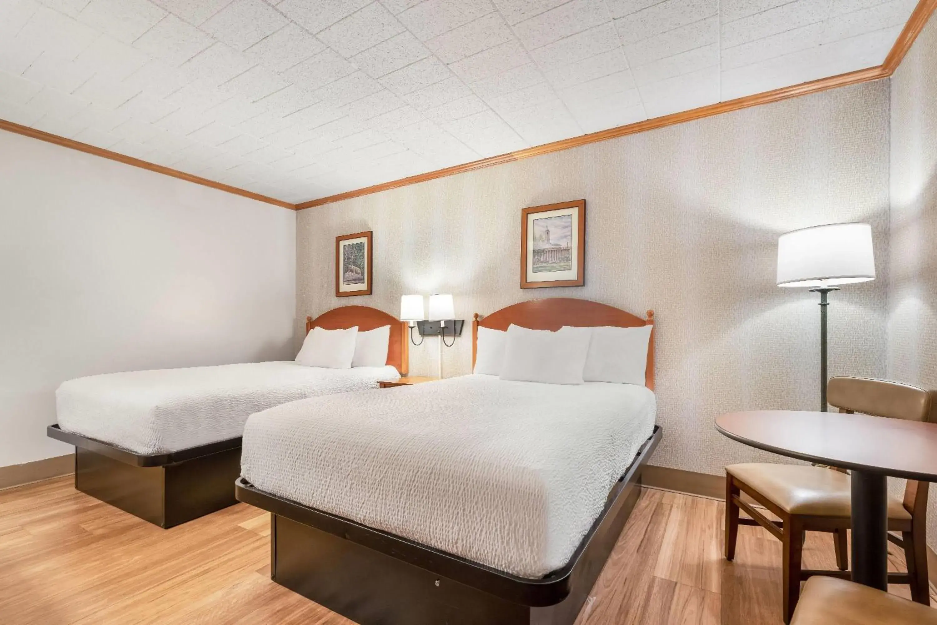 Bed in Ramada by Wyndham State College Hotel & Conference Center Bed in Ramada by Wyndham State College Hotel & Conference Center