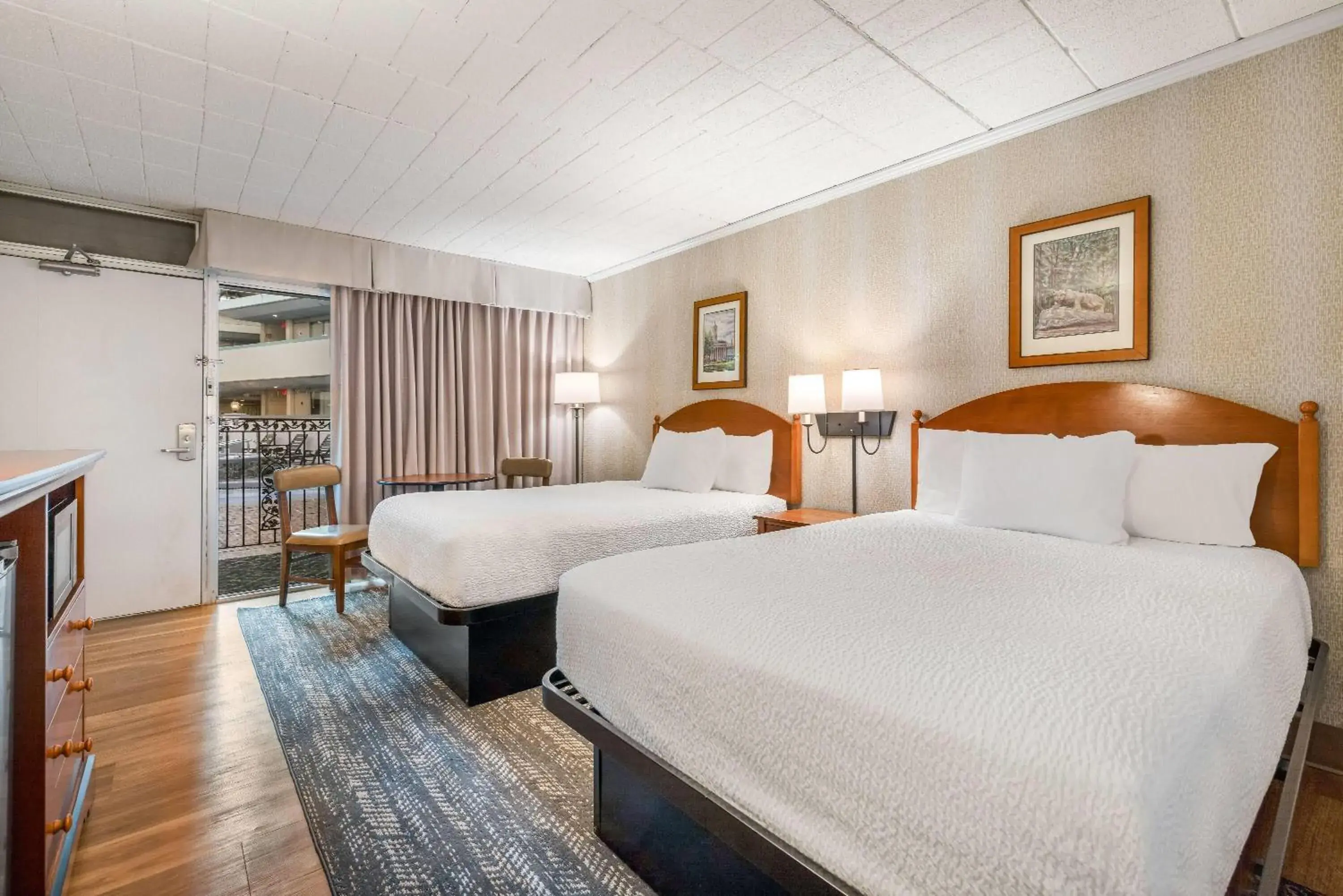 Bed in Ramada by Wyndham State College Hotel & Conference Center Bed in Ramada by Wyndham State College Hotel & Conference Center