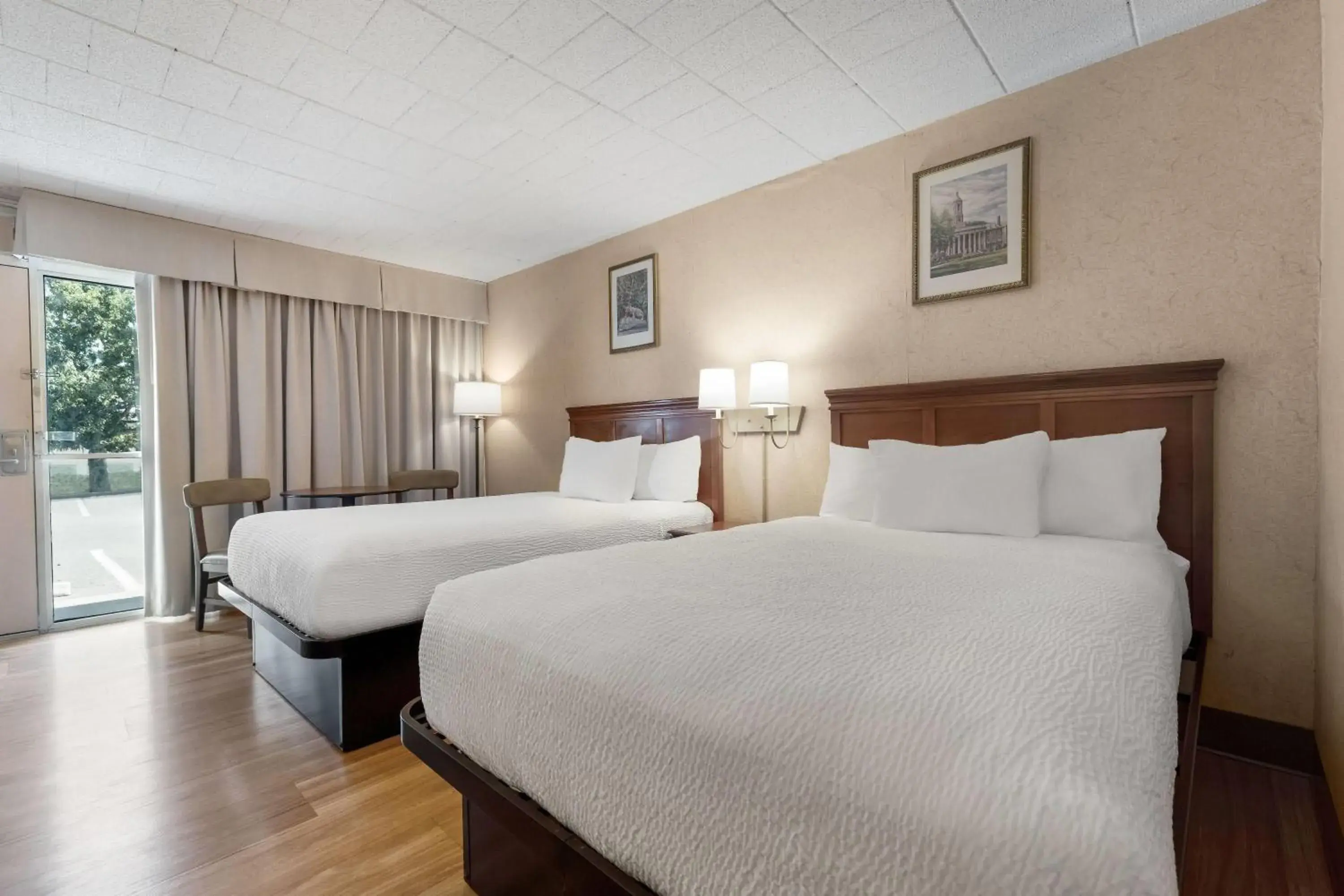 Bed in Ramada by Wyndham State College Hotel & Conference Center Bed in Ramada by Wyndham State College Hotel & Conference Center