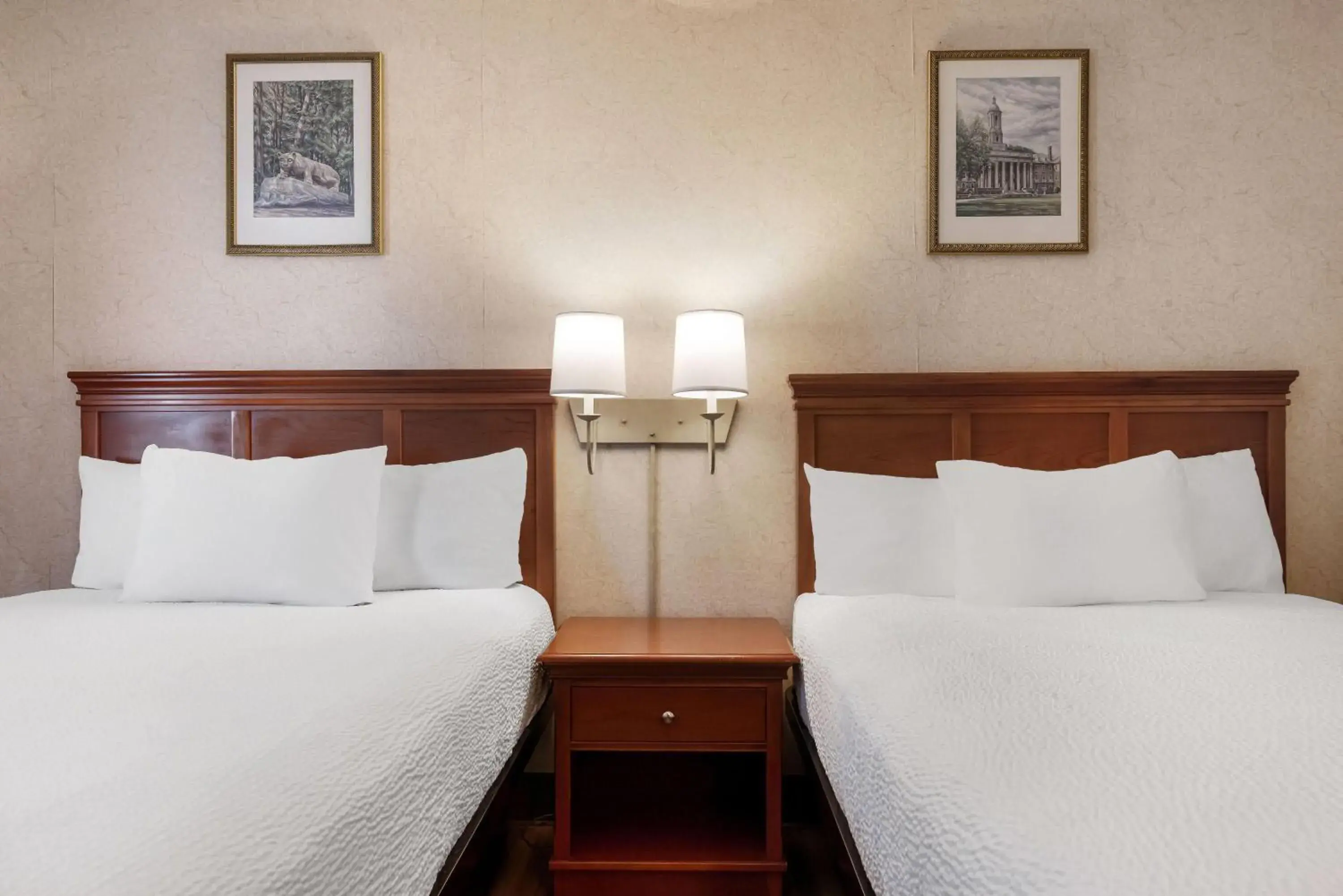 Bed in Ramada by Wyndham State College Hotel & Conference Center Bed in Ramada by Wyndham State College Hotel & Conference Center