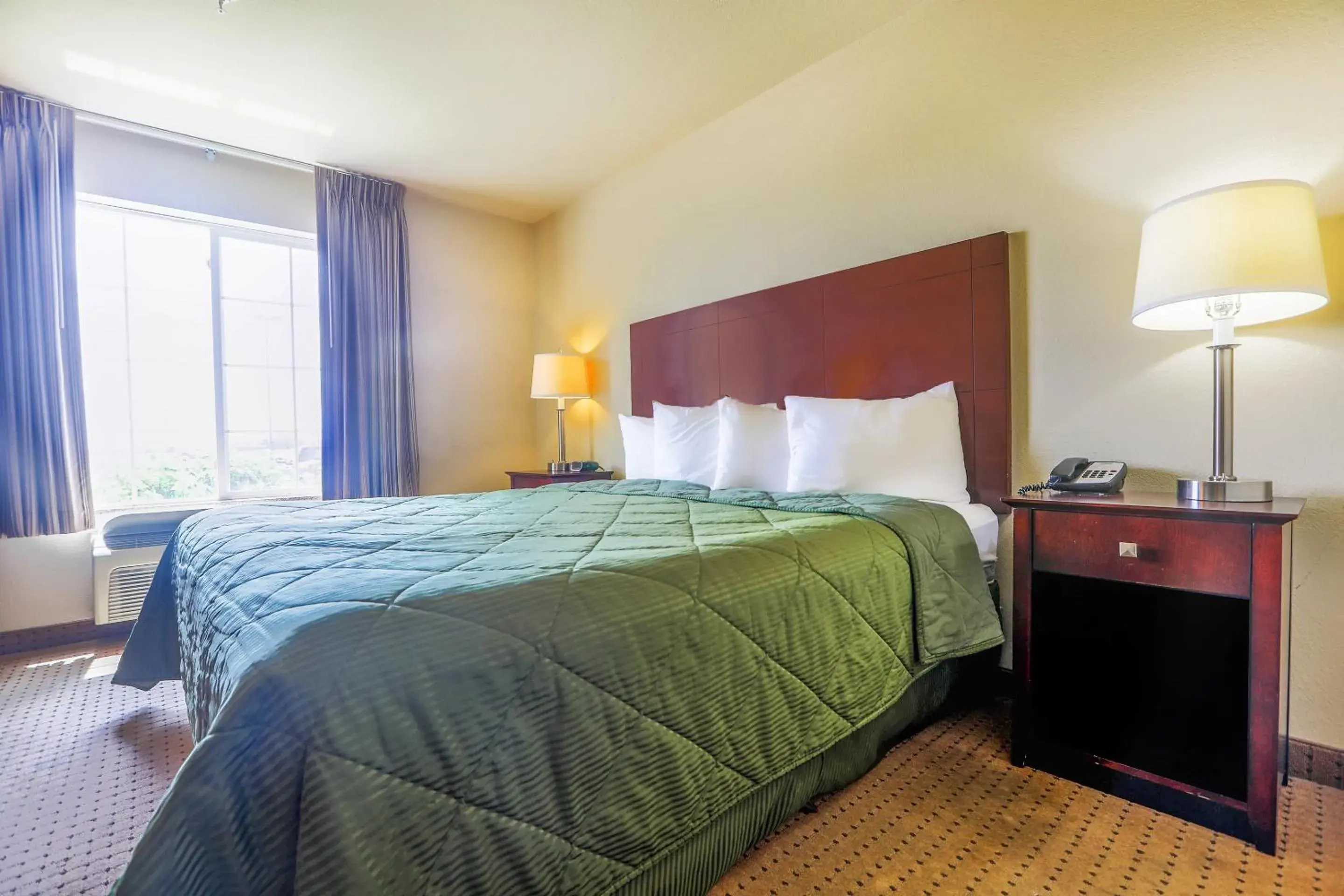Bedroom in Evansville Inn & Suites by OYO Bedroom in Evansville Inn & Suites by OYO