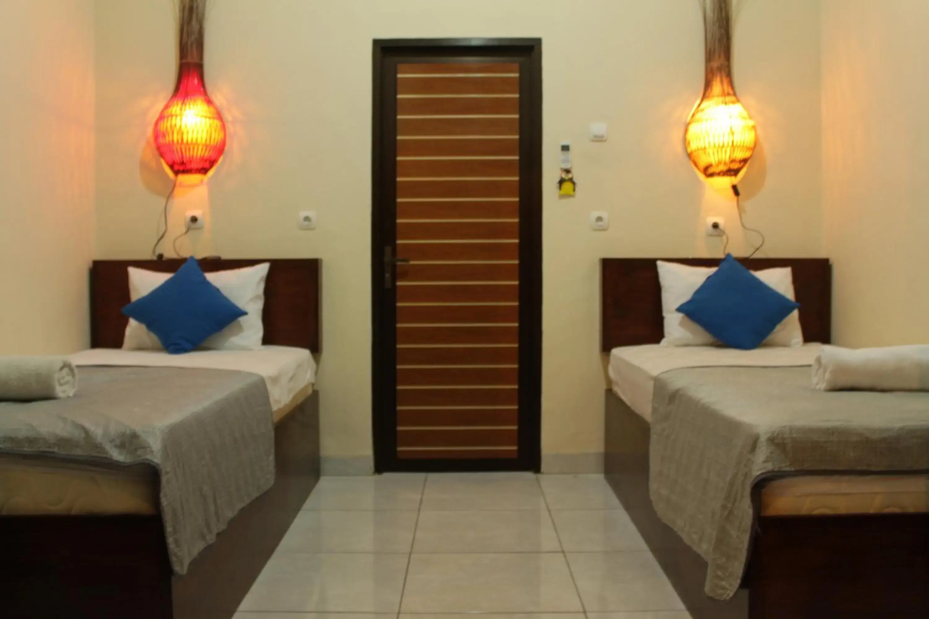 Bed in Chillin Kuta Homestay Bed in Chillin Kuta Homestay