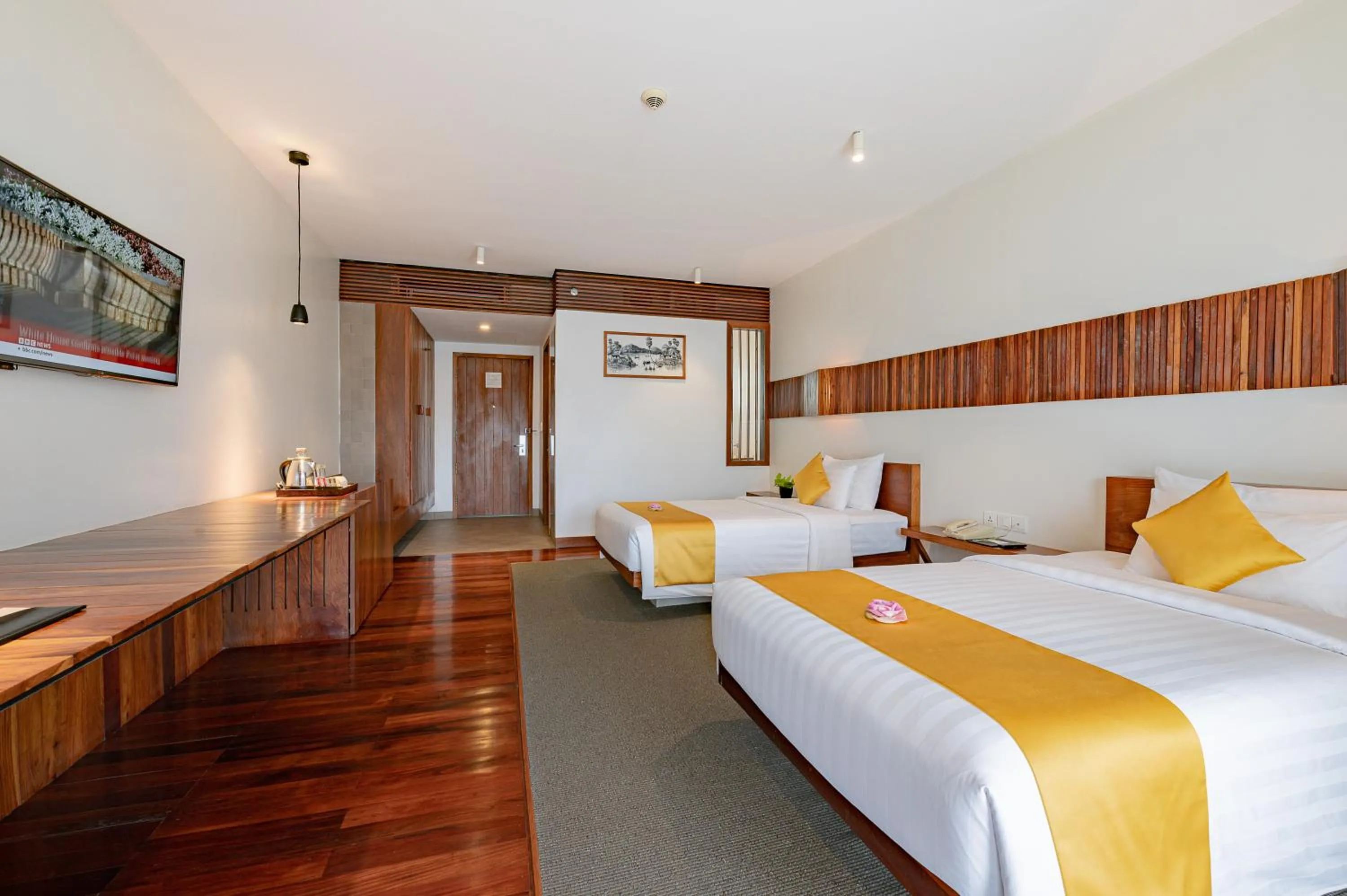 Bed in Hotel Somadevi Angkor Boutique and Resort