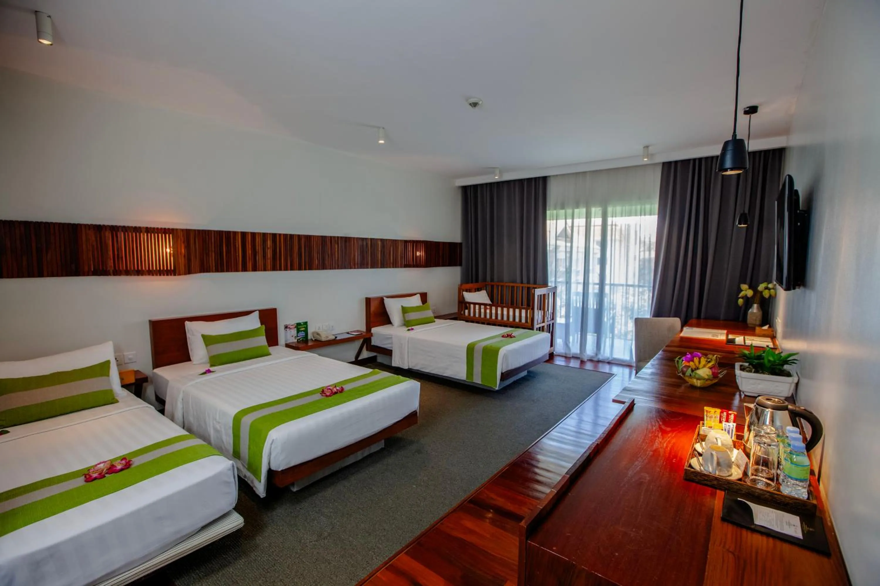Bed in Hotel Somadevi Angkor Boutique and Resort