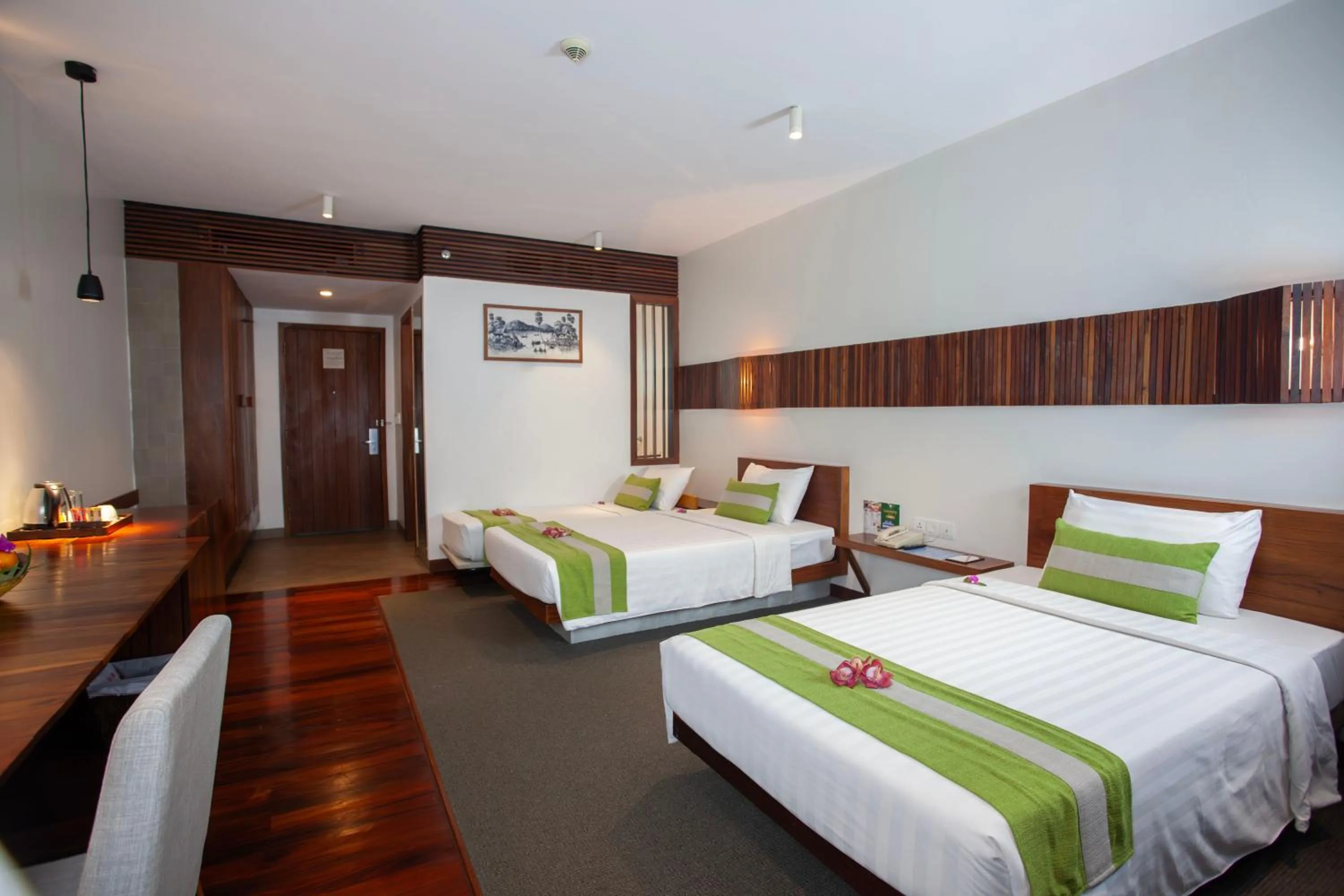 Bed in Hotel Somadevi Angkor Boutique and Resort