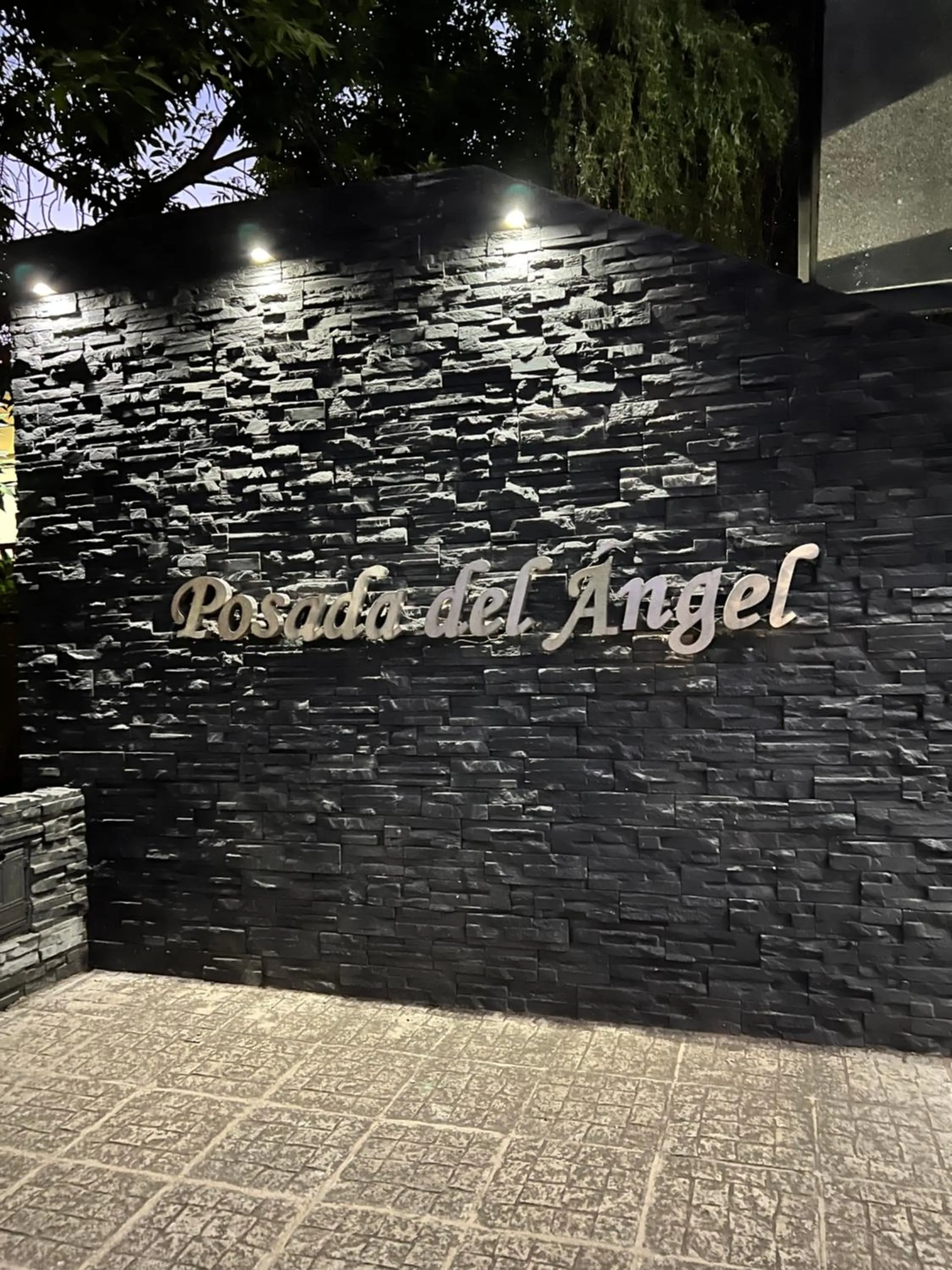 Property logo or sign in Hotel Posada del Ángel