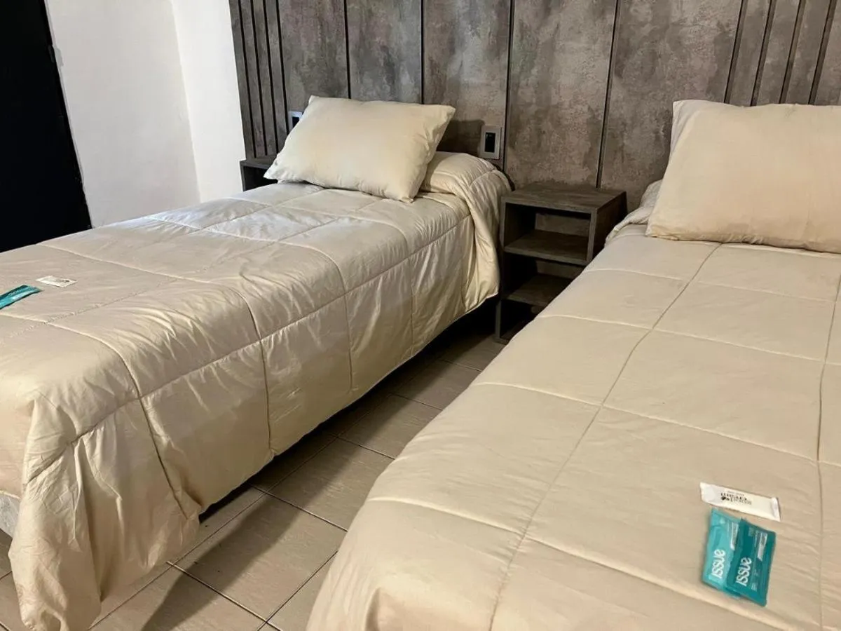 Bed in Hotel Posada del Ángel