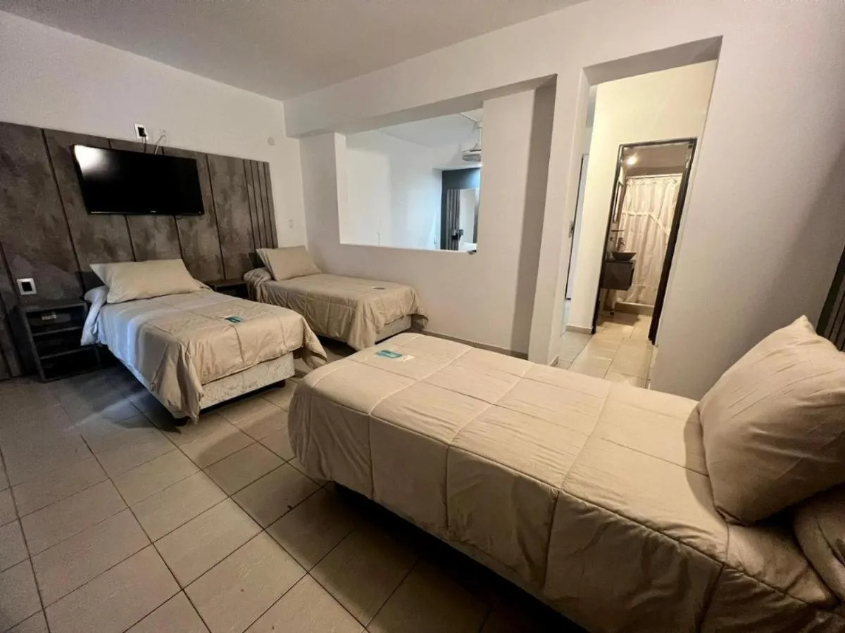 Bed in Hotel Posada del Ángel