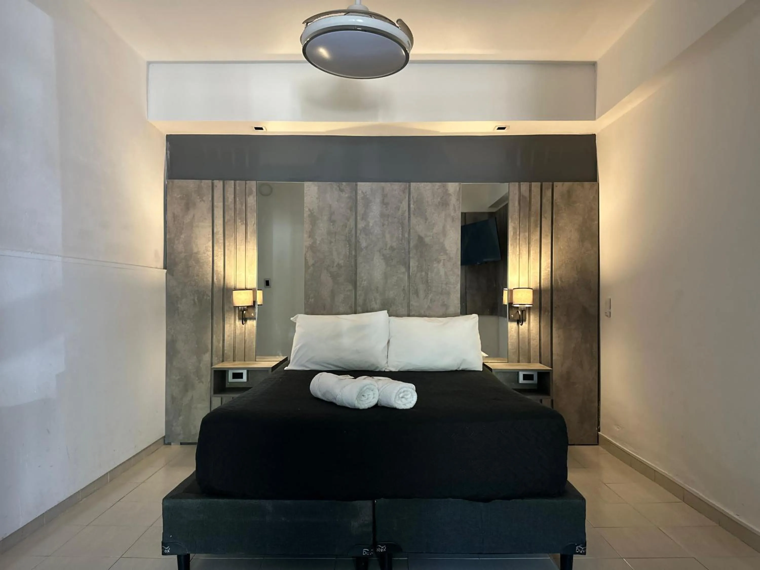 Bed in Hotel Posada del Ángel