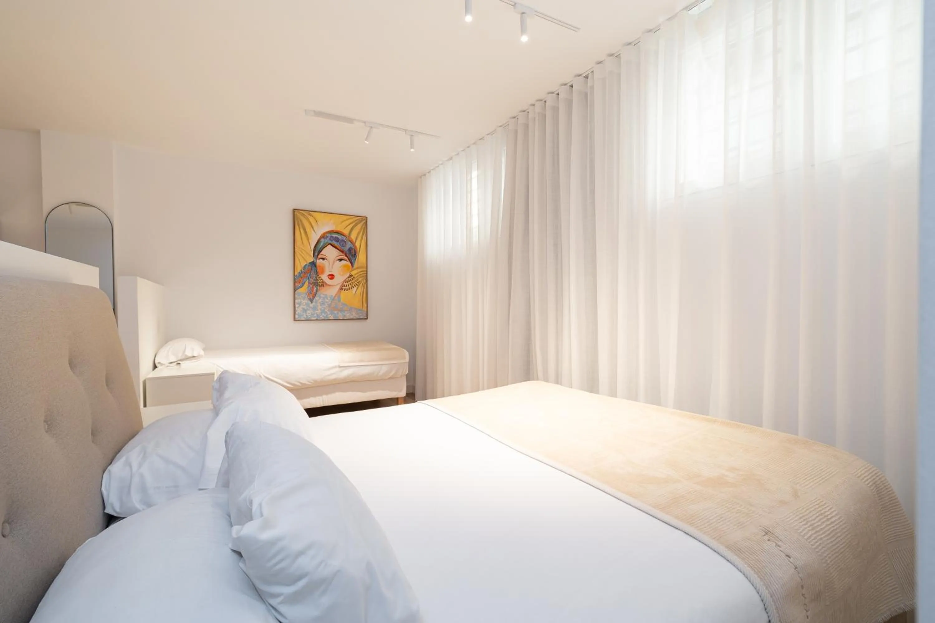 Bed in Holidays2Malaga Studios Juan de Mena