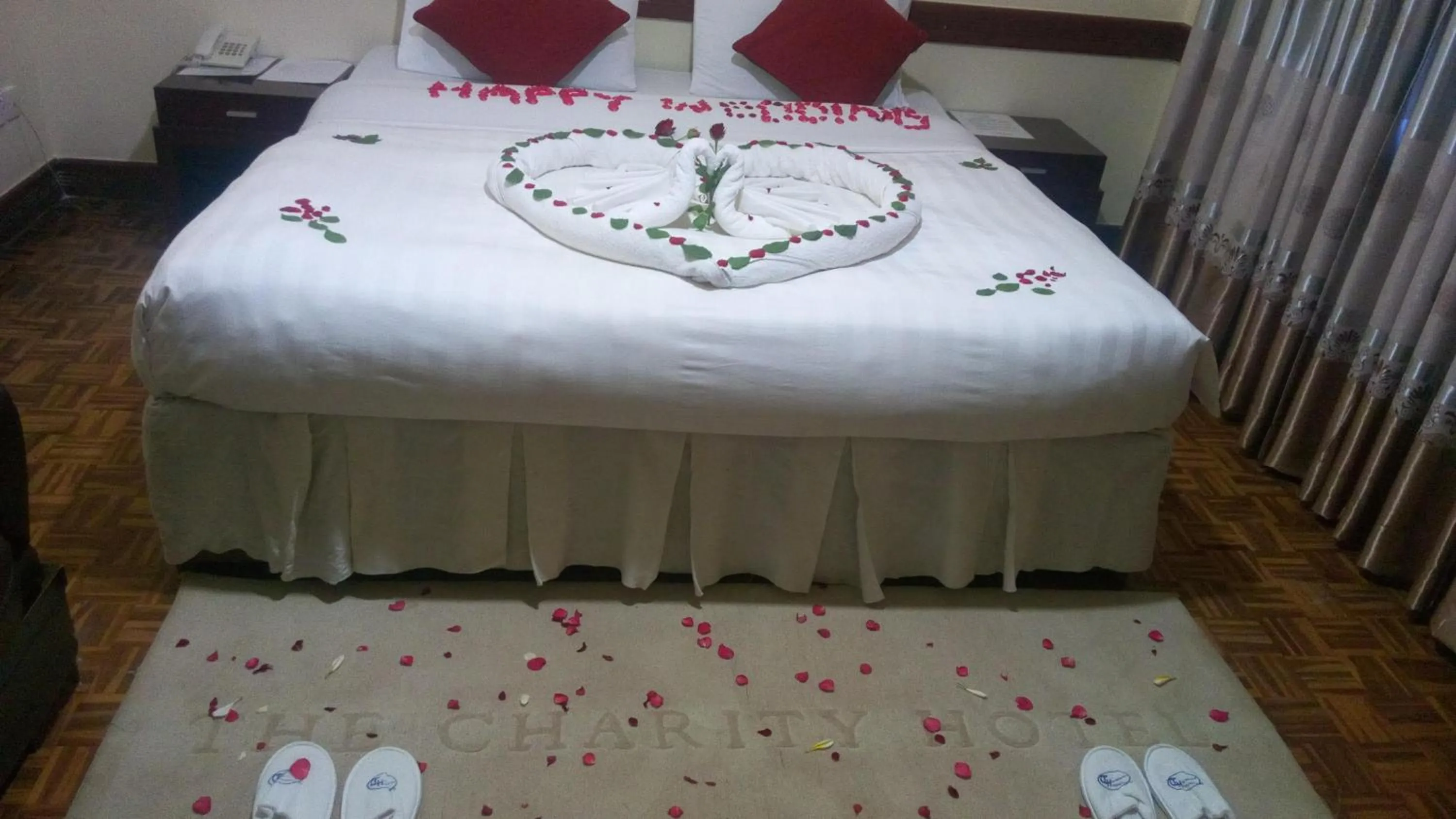 Bed in The Charity Hotel International