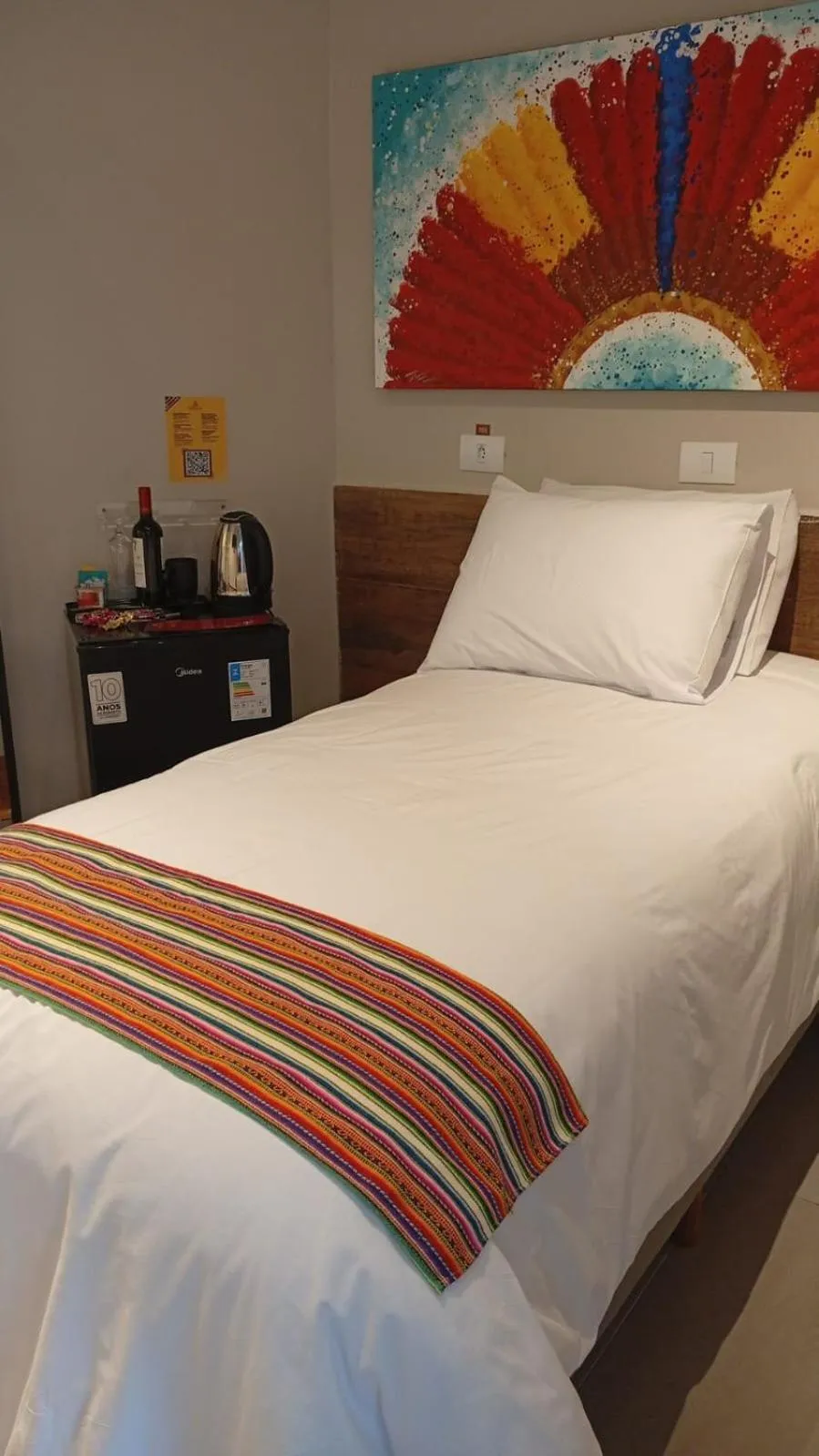 Bed in Che Hermano Suítes