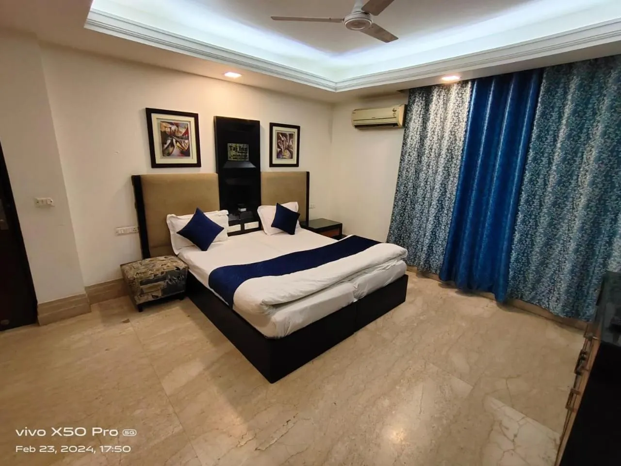 Bed in Taj Inn Residency