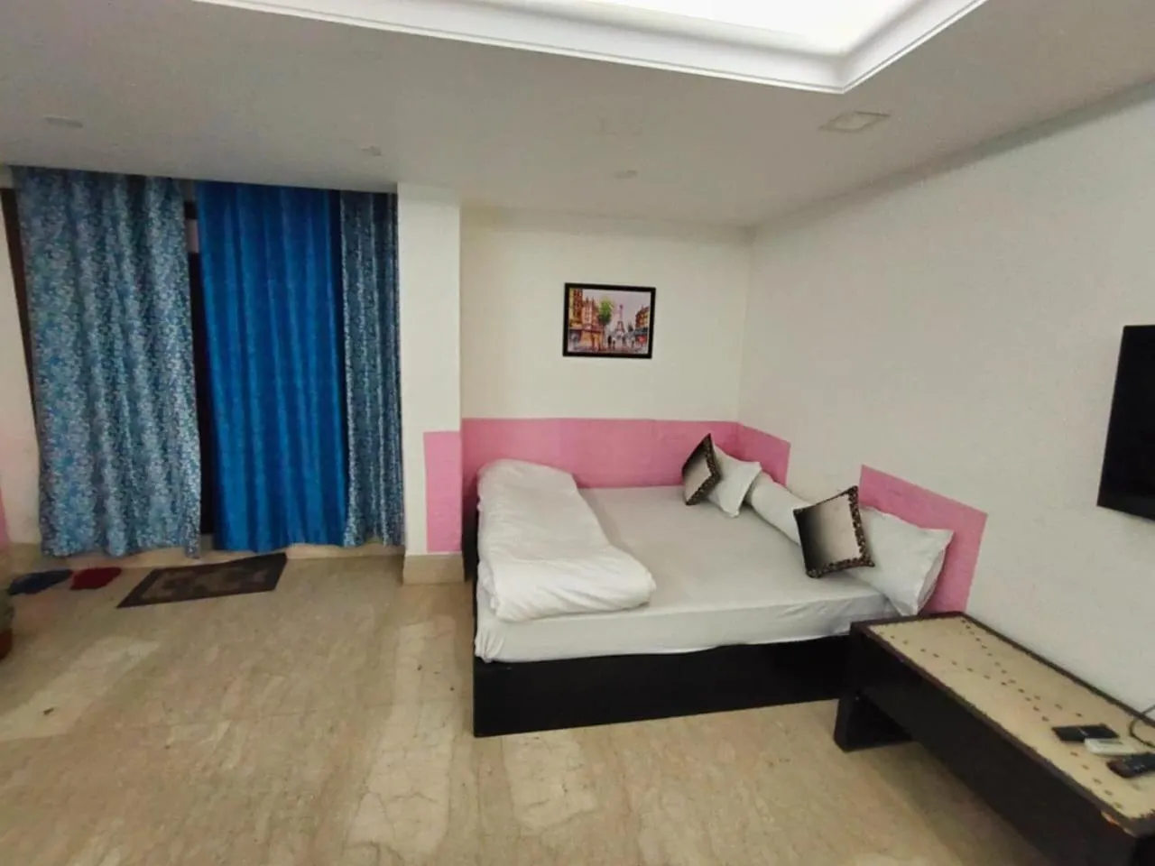 Bed in Taj Inn Residency