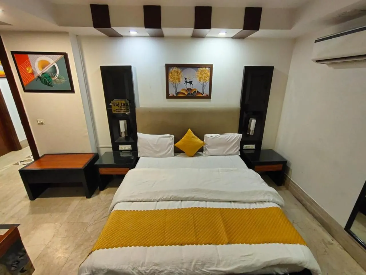 Bed in Taj Inn Residency
