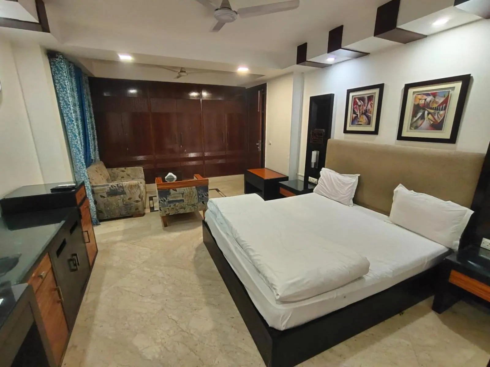 Bed in Taj Inn Residency