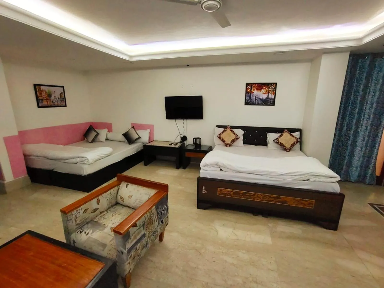 Bed in Taj Inn Residency