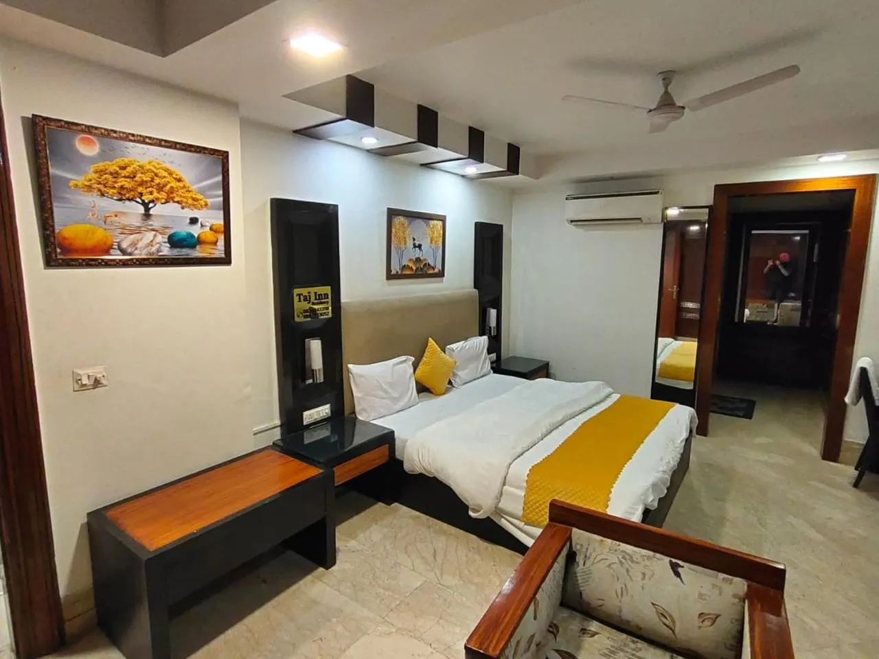 Bed in Taj Inn Residency