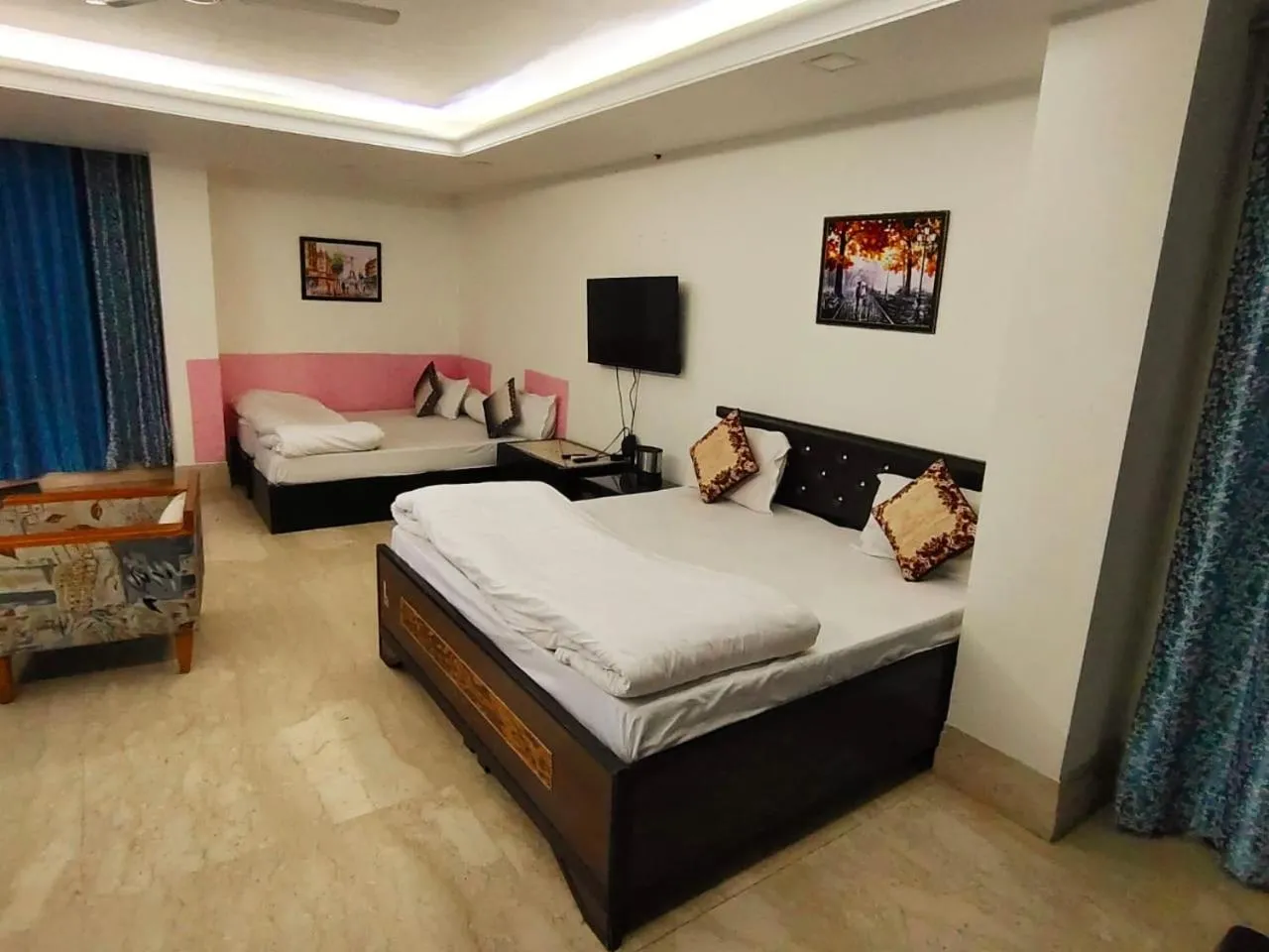 Bed in Taj Inn Residency