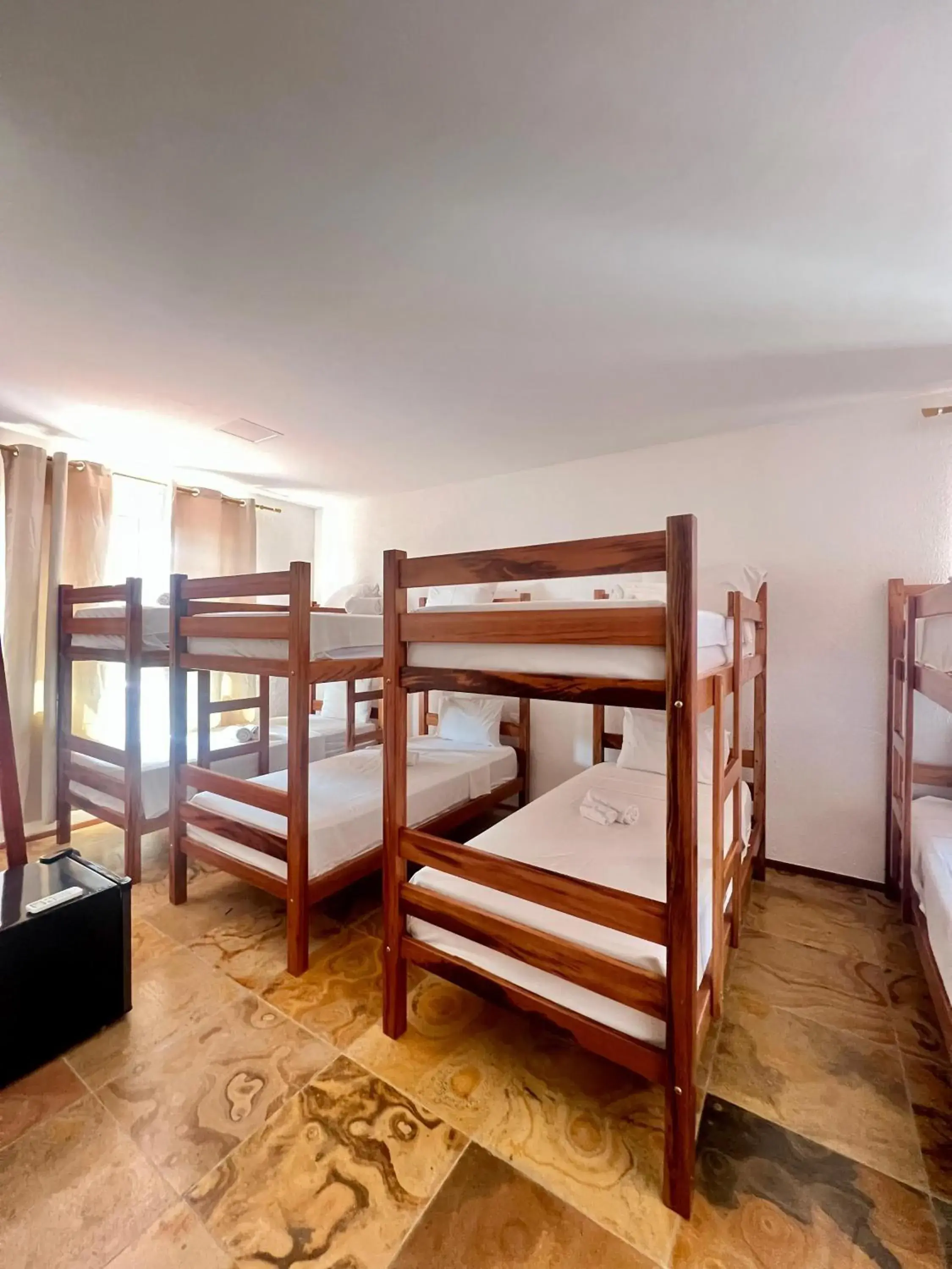 Bunk Bed in Mixed Dormitory Room in Bosque Cumbuco Pousada Bunk Bed in Mixed Dormitory Room in Bosque Cumbuco Pousada