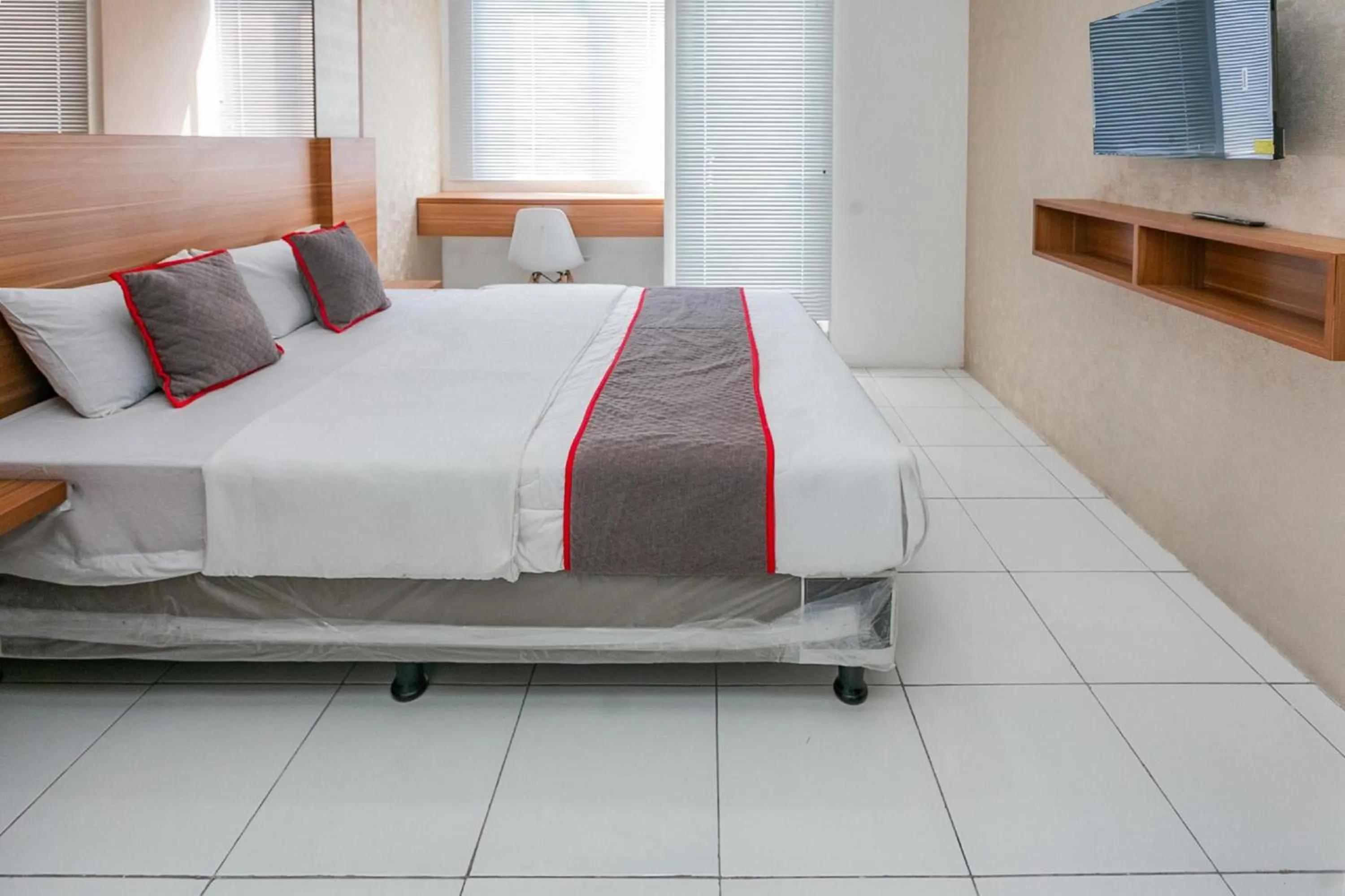 Photo of the whole room, Bed in Hotel O Tower Mahakam serviced apartment Riverview Jababeka